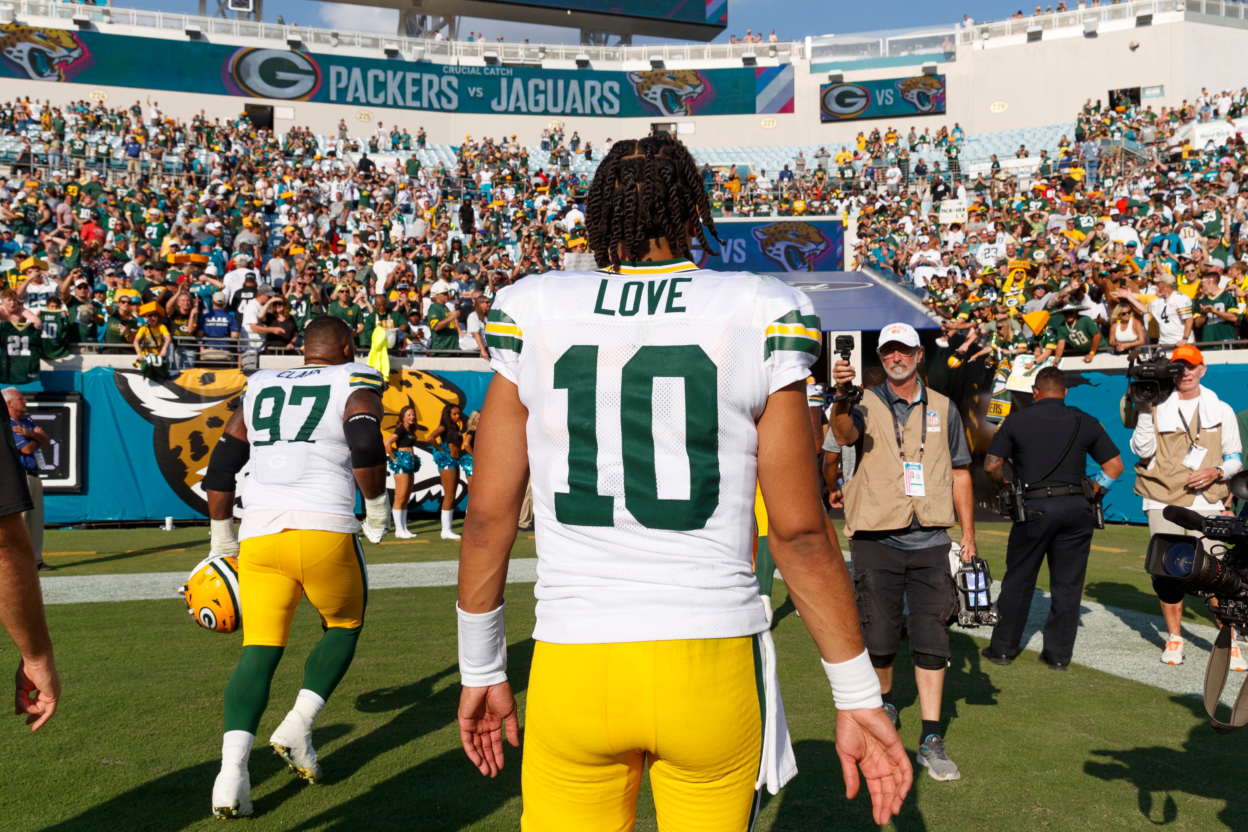 Green Bay Packers quarterback Jordan Love (10) heads to the locker room after the game against the Jacksonville Jaguars at EverBank Stadium.