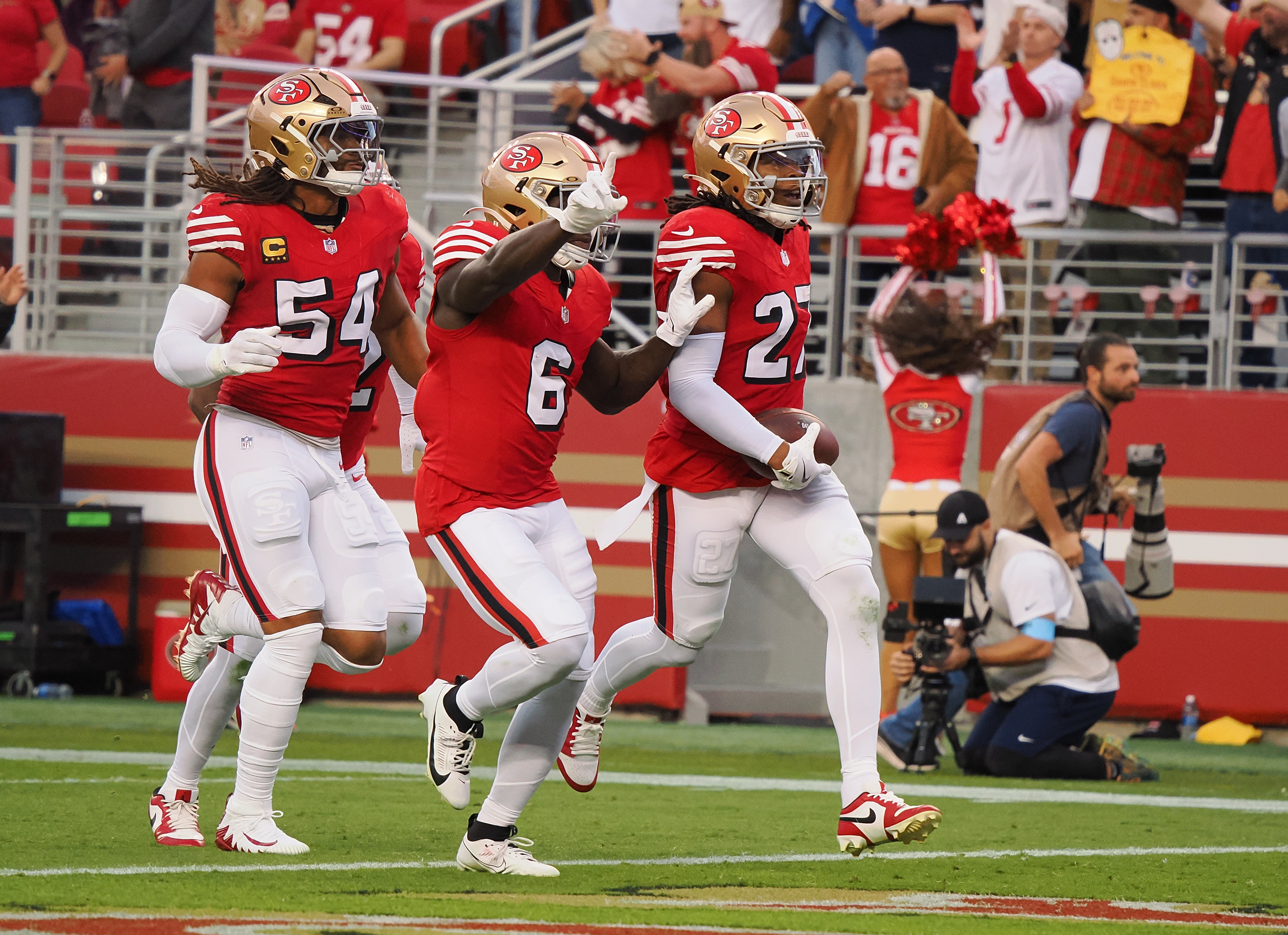 San Francisco 49ers safety Ji'Ayir Brown (27) celebrates after an interception against the Dallas Cowboys during the first quarter at Levi's Stadium.