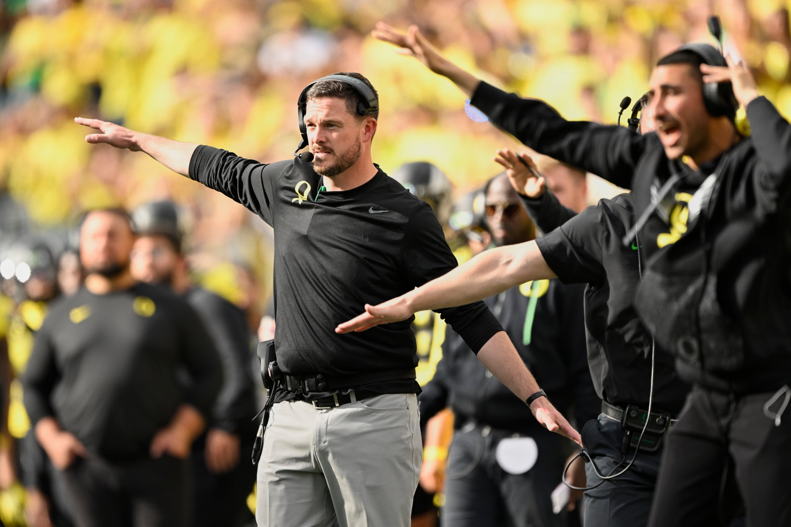Oct 26, 2024; Eugene, Oregon, USA; Oregon Ducks head coach Dan Lanning signals to the defense during the second half against the Illinois Fighting Illini at Autzen Stadium.