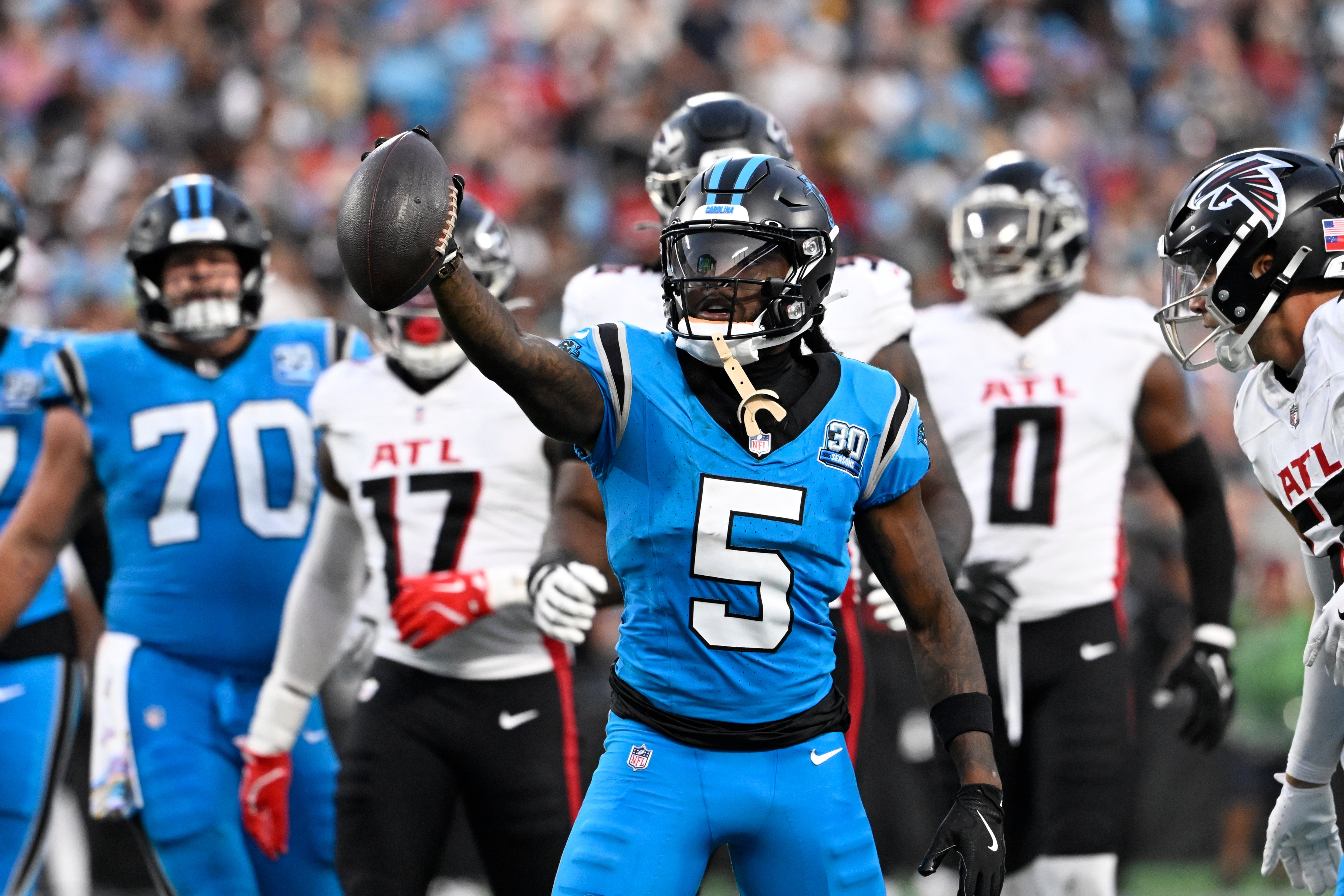 Oct 13, 2024; Charlotte, North Carolina, USA; Carolina Panthers wide receiver Diontae Johnson (5) reacts after making a catch in the second quarter at Bank of America Stadium.