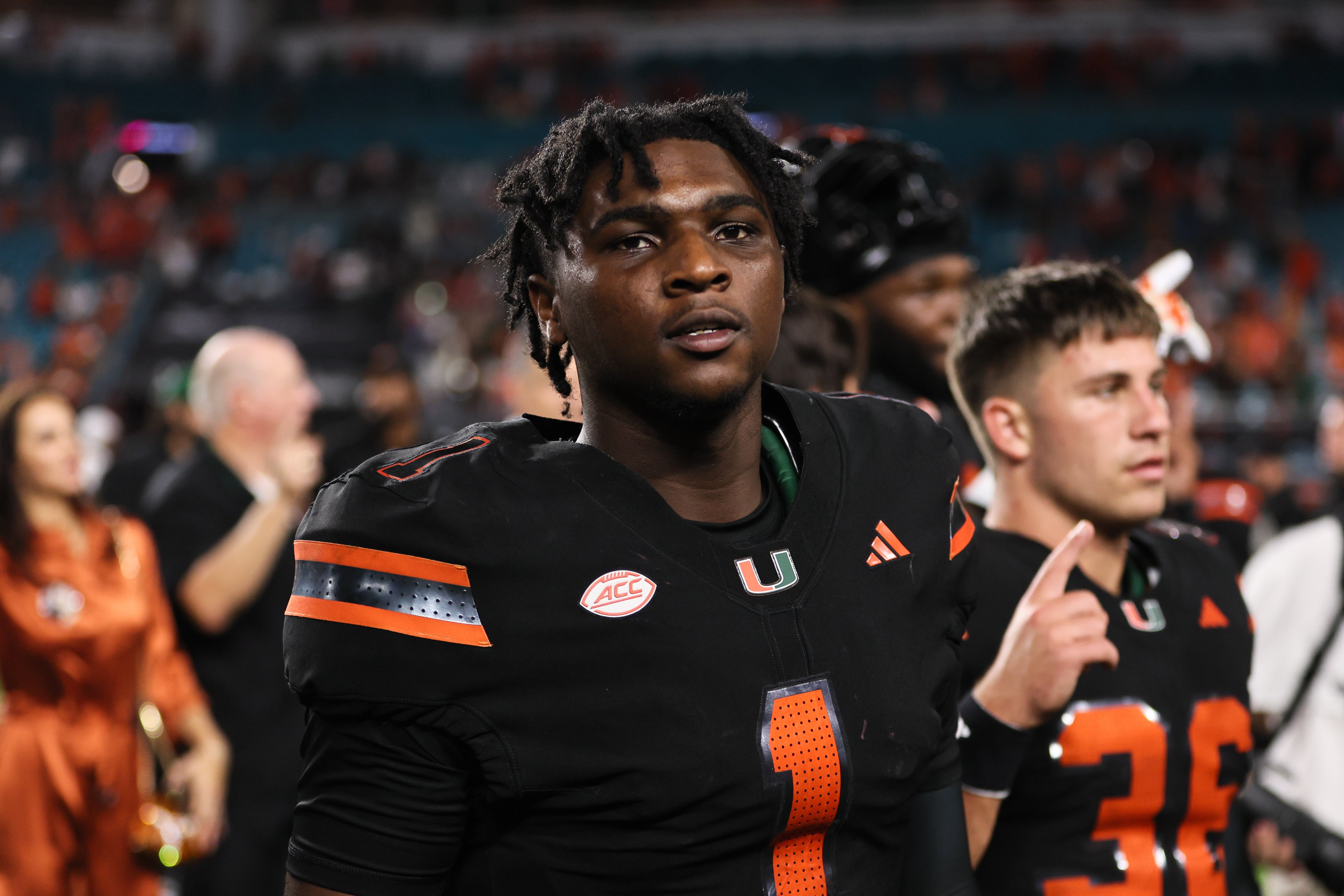 Oct 26, 2024; Miami Gardens, Florida, USA; Miami Hurricanes quarterback Cam Ward (1) looks on after the game against the Florida State Seminoles at Hard Rock Stadium.