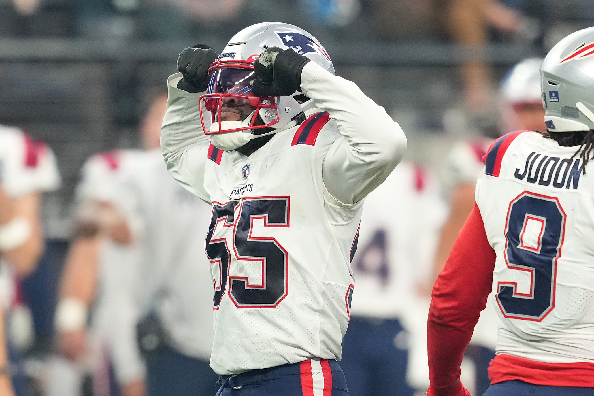 Patriots linebacker Josh Uche celebrates after getting a sack against the Raiders.