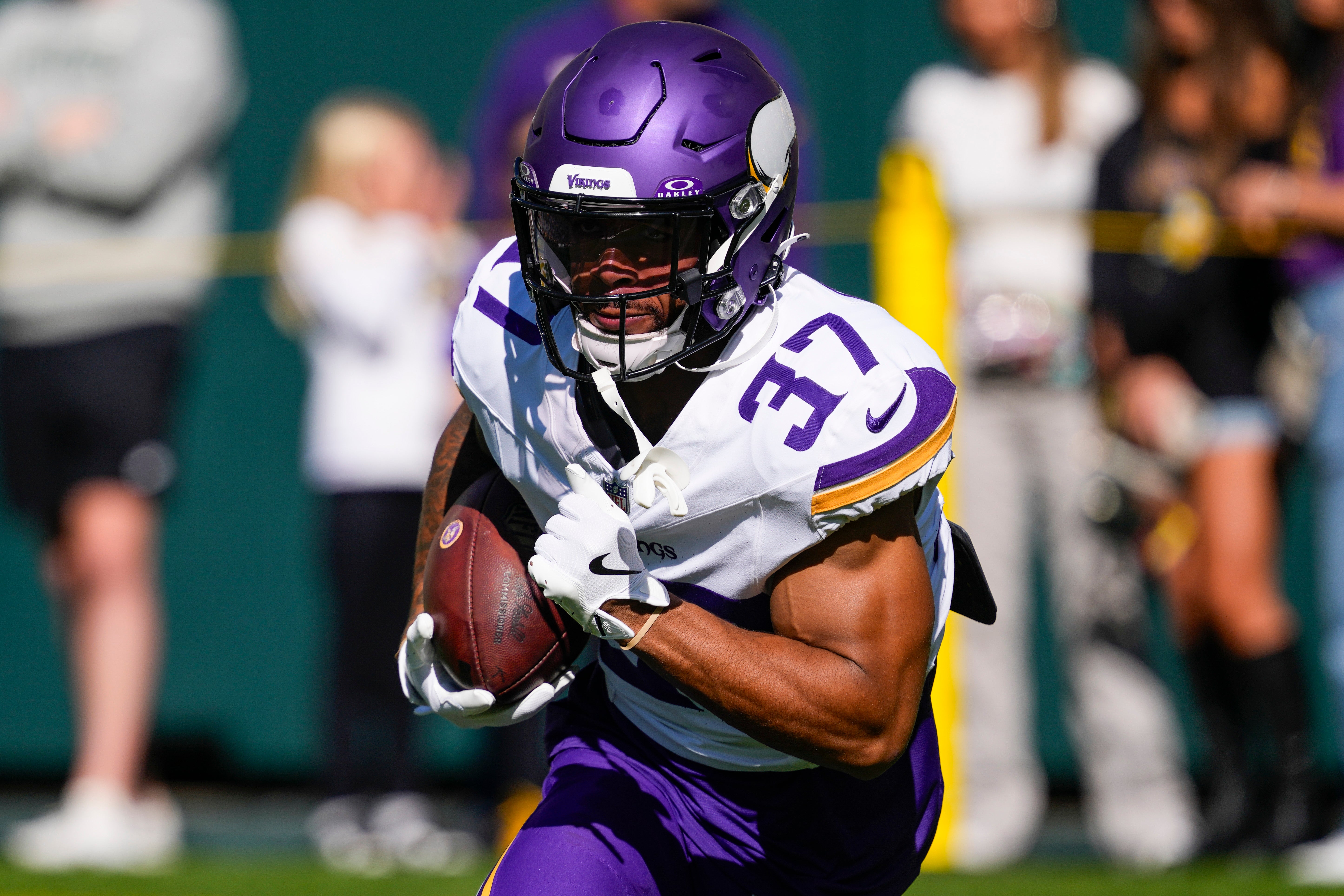 Sep 29, 2024; Green Bay, Wisconsin, USA; Minnesota Vikings running back Myles Gaskin (37) during warmups prior to the game against the Green Bay Packers at Lambeau Field.