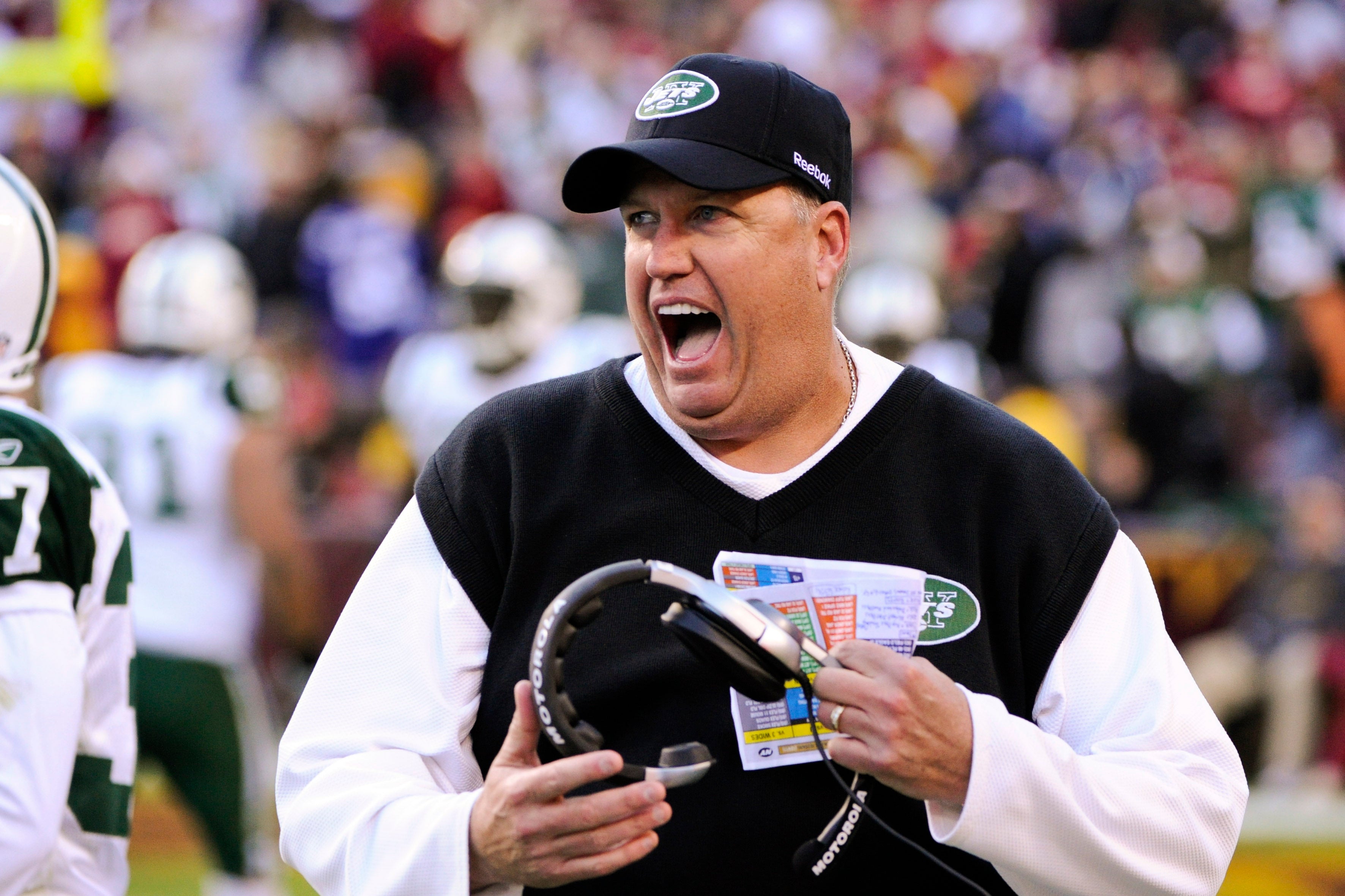 New York Jets head coach Rex Ryan celebrates a turnover during the fourth quarter against the Washington Redskins at FedEx Field. the Jets defeated the Redskins 34-19.