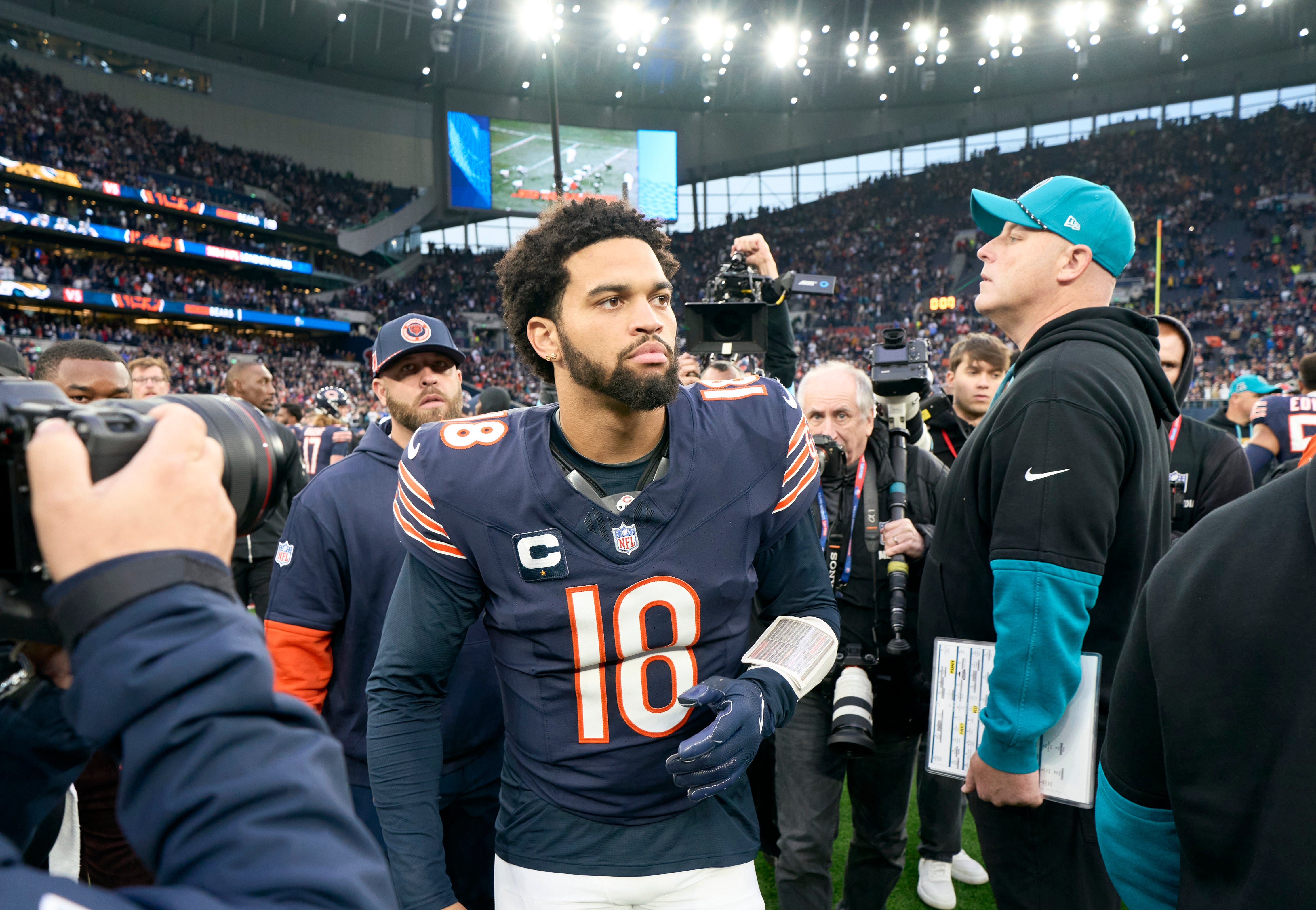 Oct 13, 2024; London, United Kingdom; Chicago Bears quarterback Caleb Williams (18) on the field after the second half of an NFL International Series game at Tottenham Hotspur Stadium.