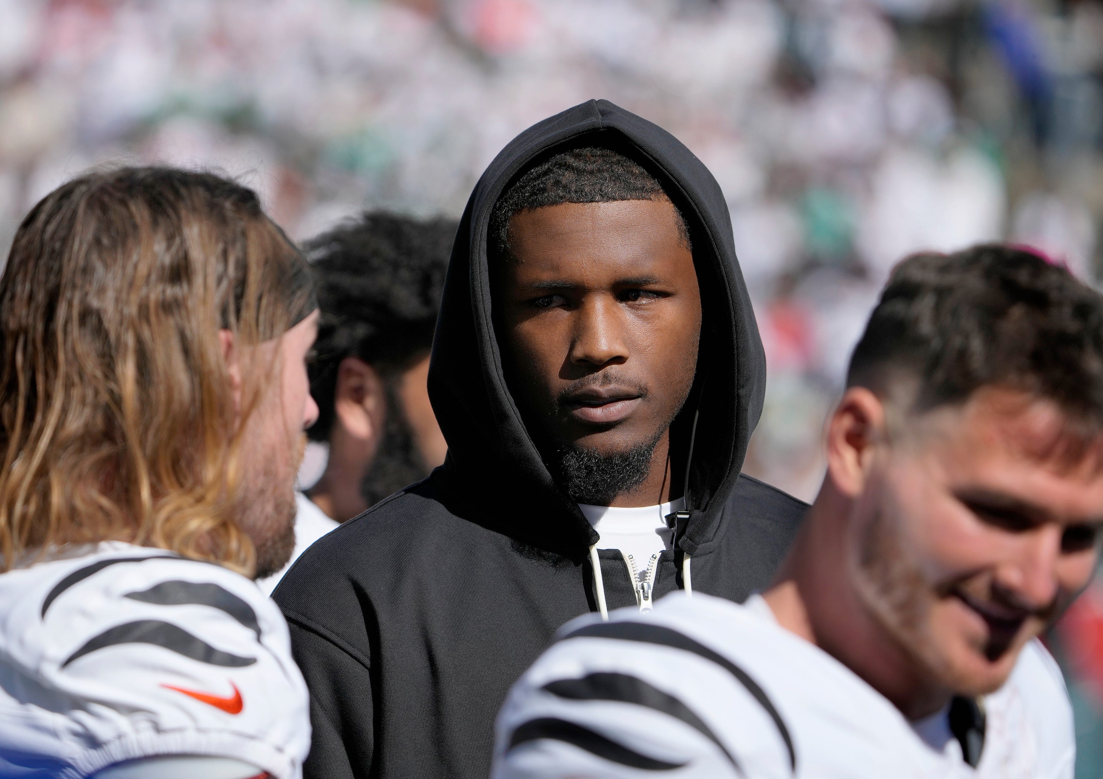 Cincinnati Bengals wide receiver Tee Higgins (5) talks with his teammates as the Bengals face the Philadelphia Eagles during the NFL Week 8 matchup at Paycor Stadium Sunday October 27, 2024. Higgins missed the game due to an injury.