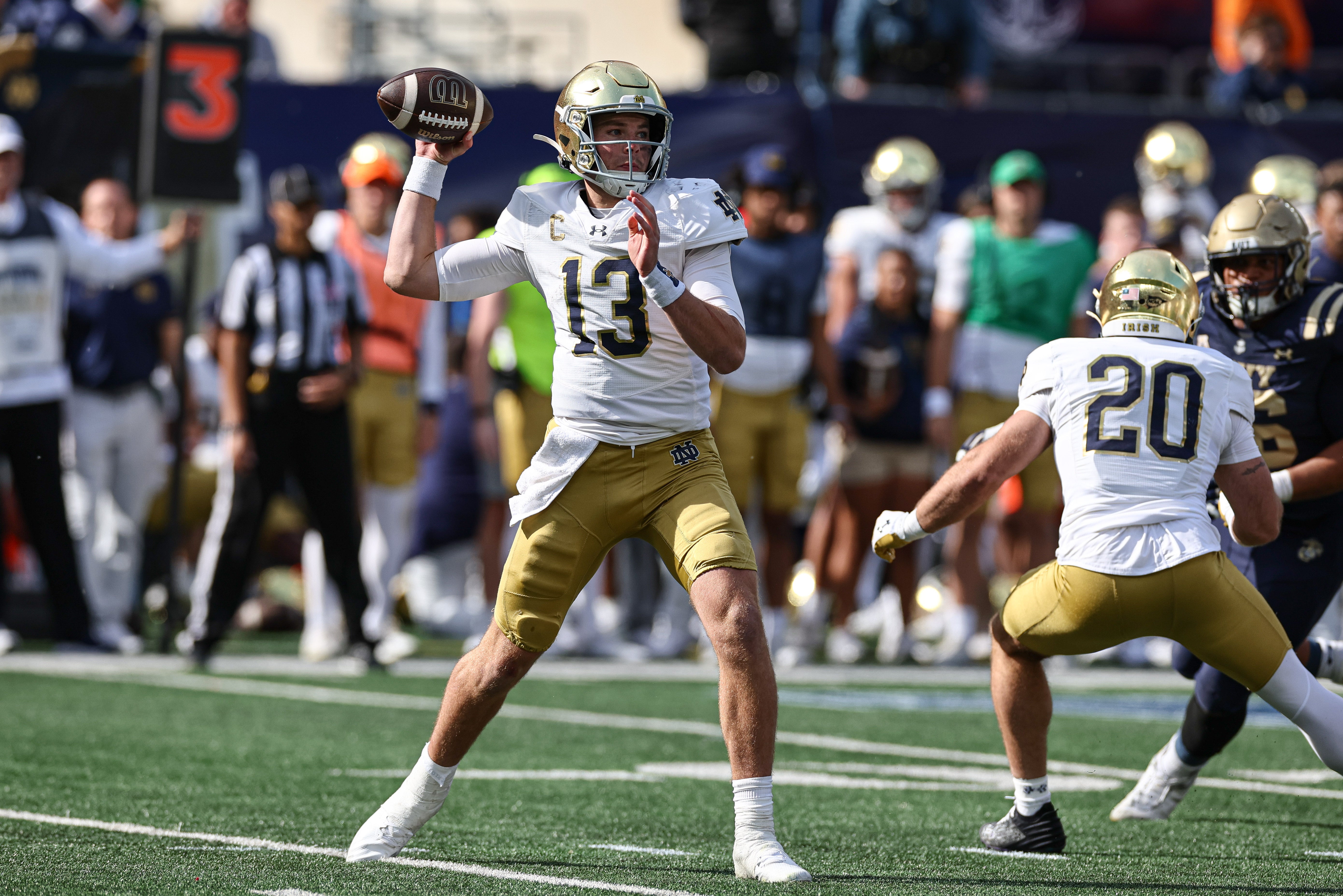 Notre Dame Fighting Irish quarterback Riley Leonard (13) throws the ball during the first half against the Navy Midshipmen at MetLife Stadium.