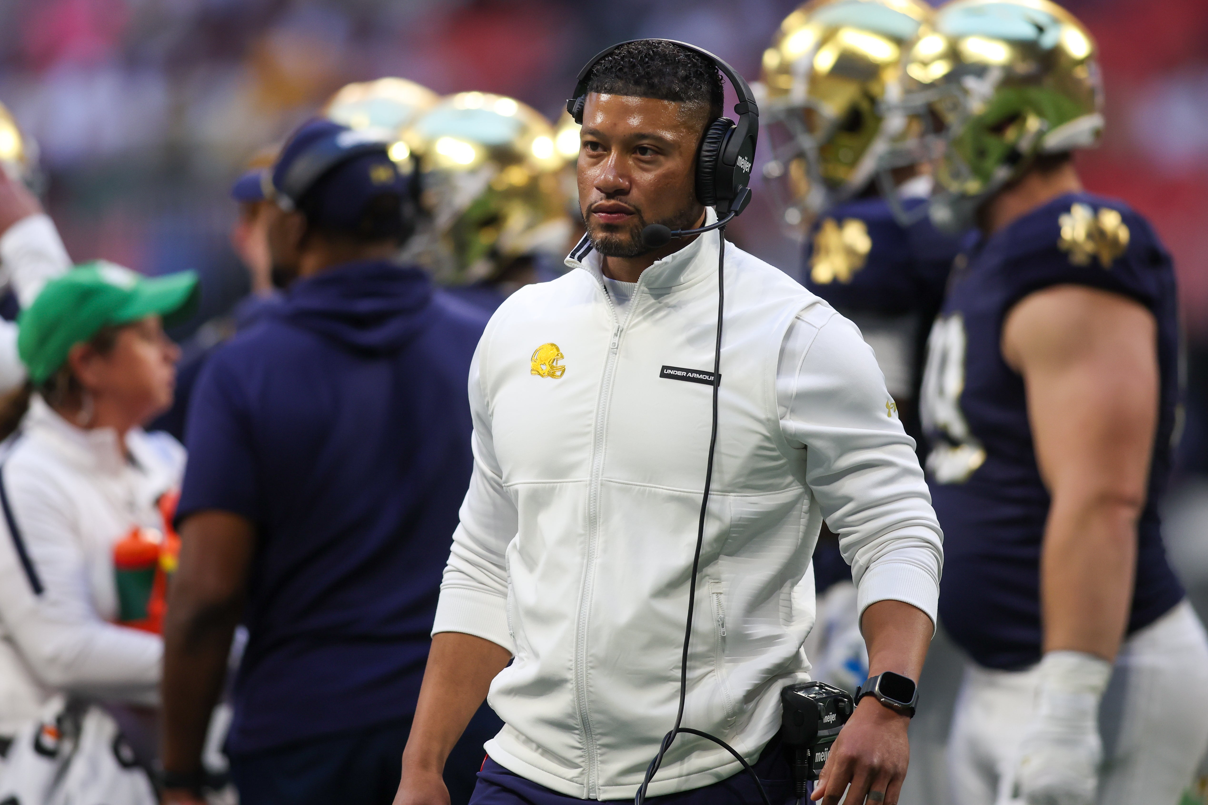 Notre Dame Fighting Irish head coach Marcus Freeman on the field against the Georgia Tech Yellow Jackets in the fourth quarter at Mercedes-Benz Stadium.
