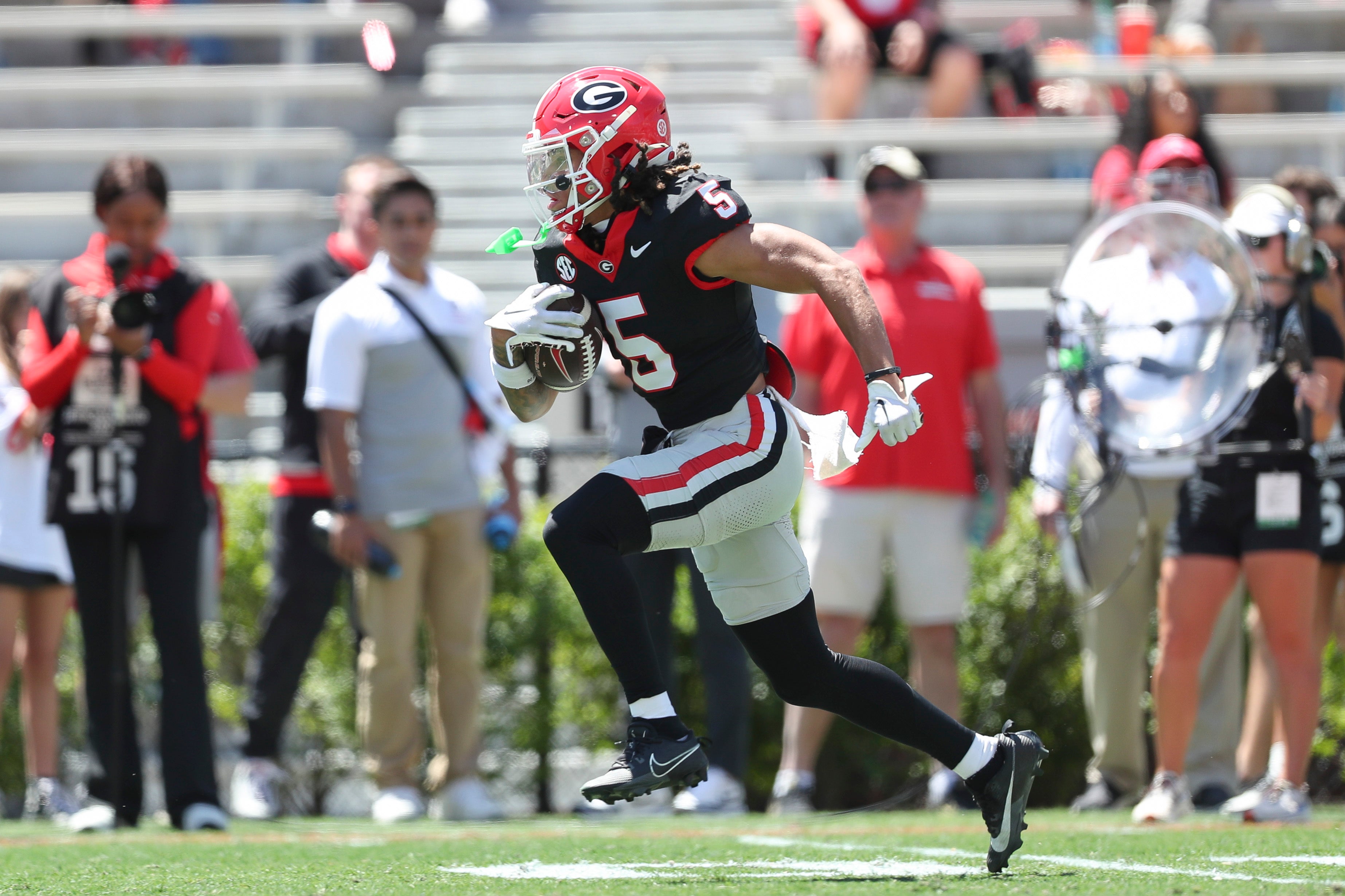 Georgia Bulldogs wide receiver Anthony Evans III (5) runs with the ball during the G-Day Game at Sanford Stadium.