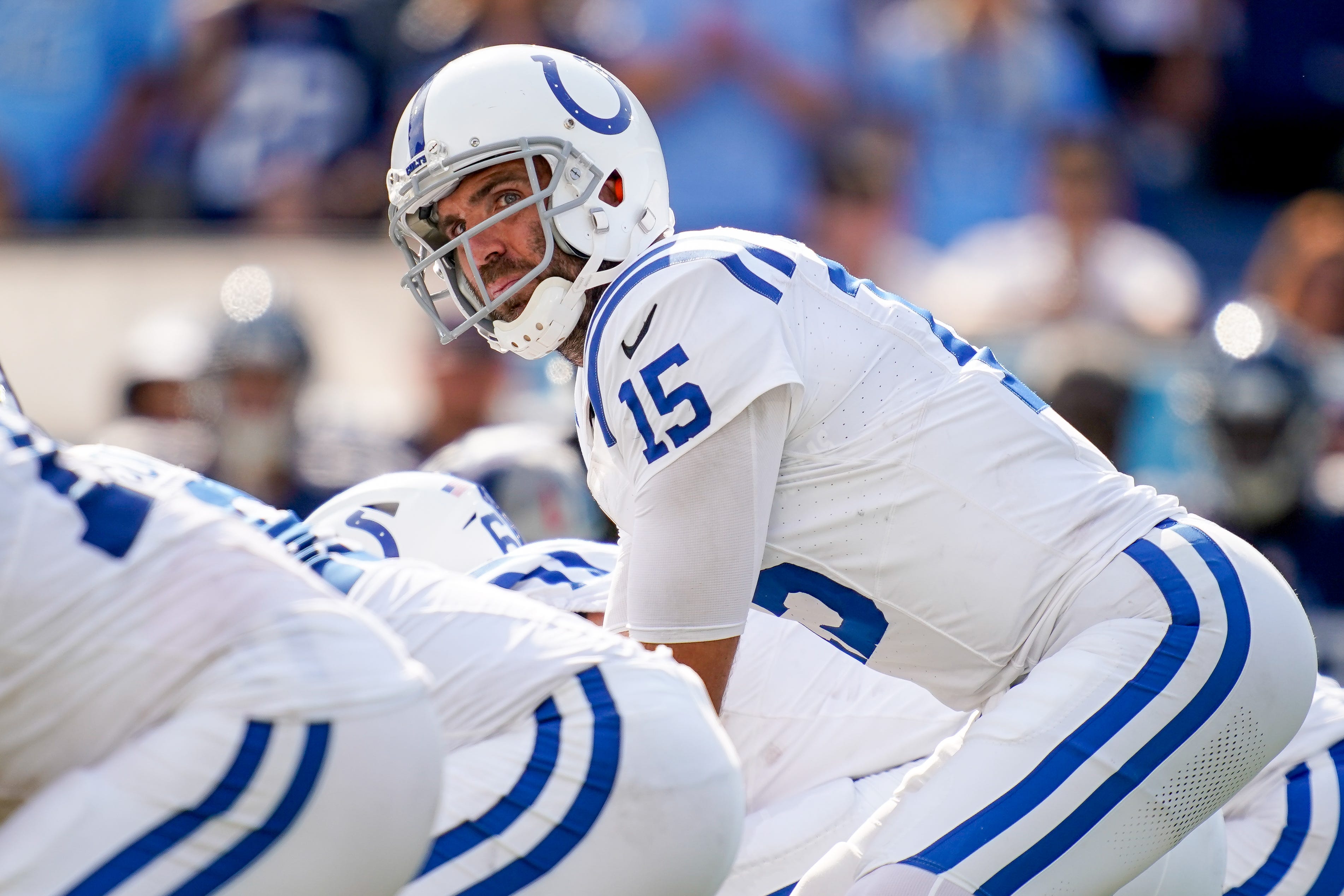 Indianapolis Colts quarterback Joe Flacco (15) gets in position against the Tennessee Titans during the fourth quarter at Nissan Stadium in Nashville, Tenn., Sunday, Oct. 13, 2024.
