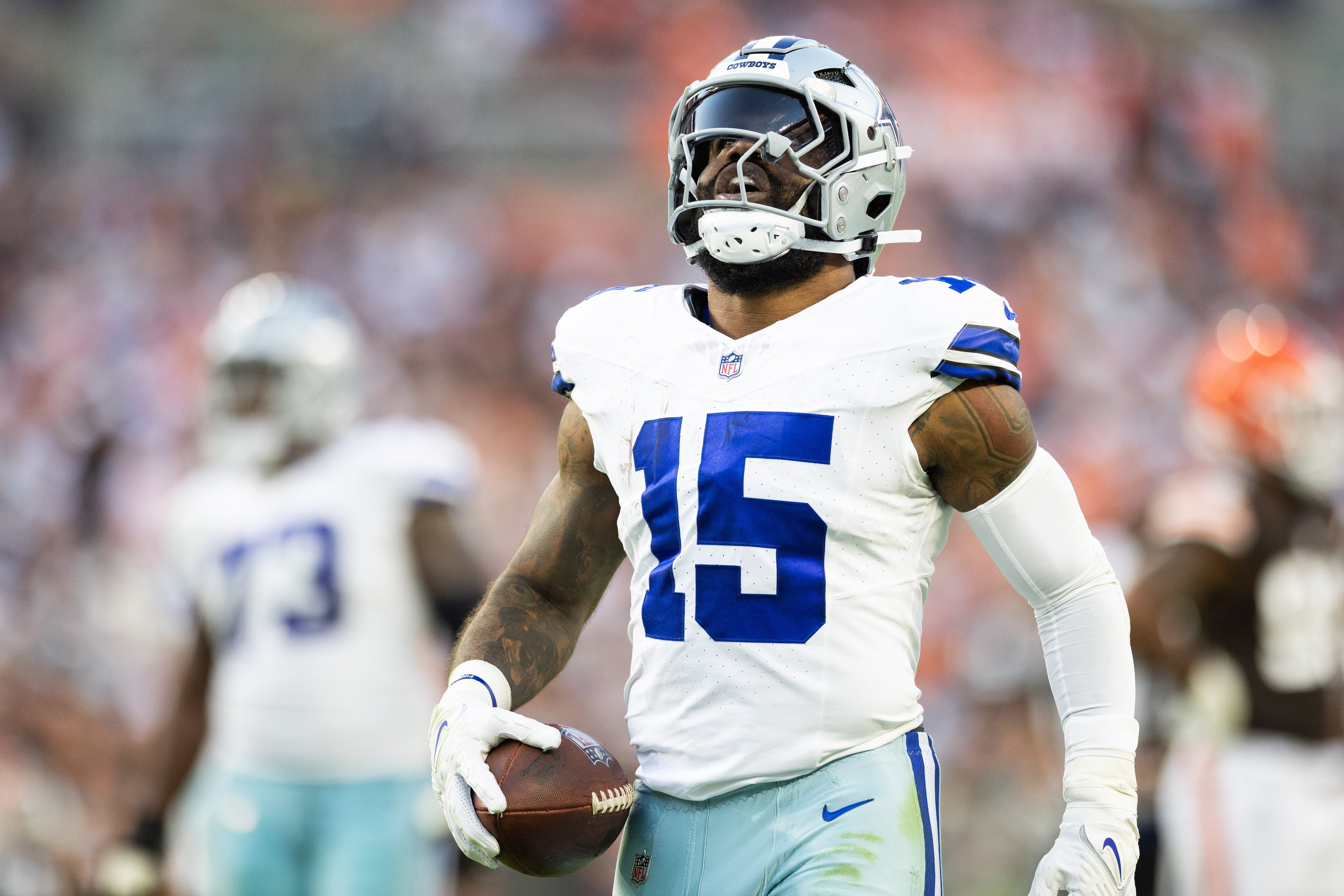 Dallas Cowboys running back Ezekiel Elliott (15) celebrates his first down run against the Cleveland Browns during the fourth quarter at Huntington Bank Field.