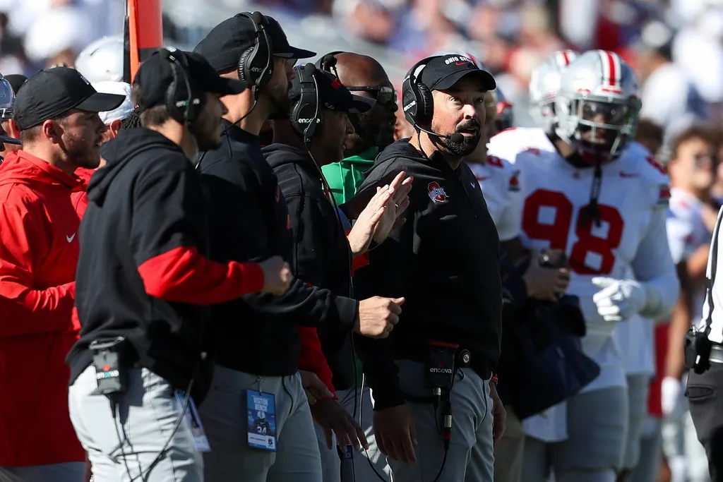 Ohio State Buckeyes head coach Ryan Day looks on from the sideline during the second quarter against the Penn State Nittany Lions at Beaver Stadium.