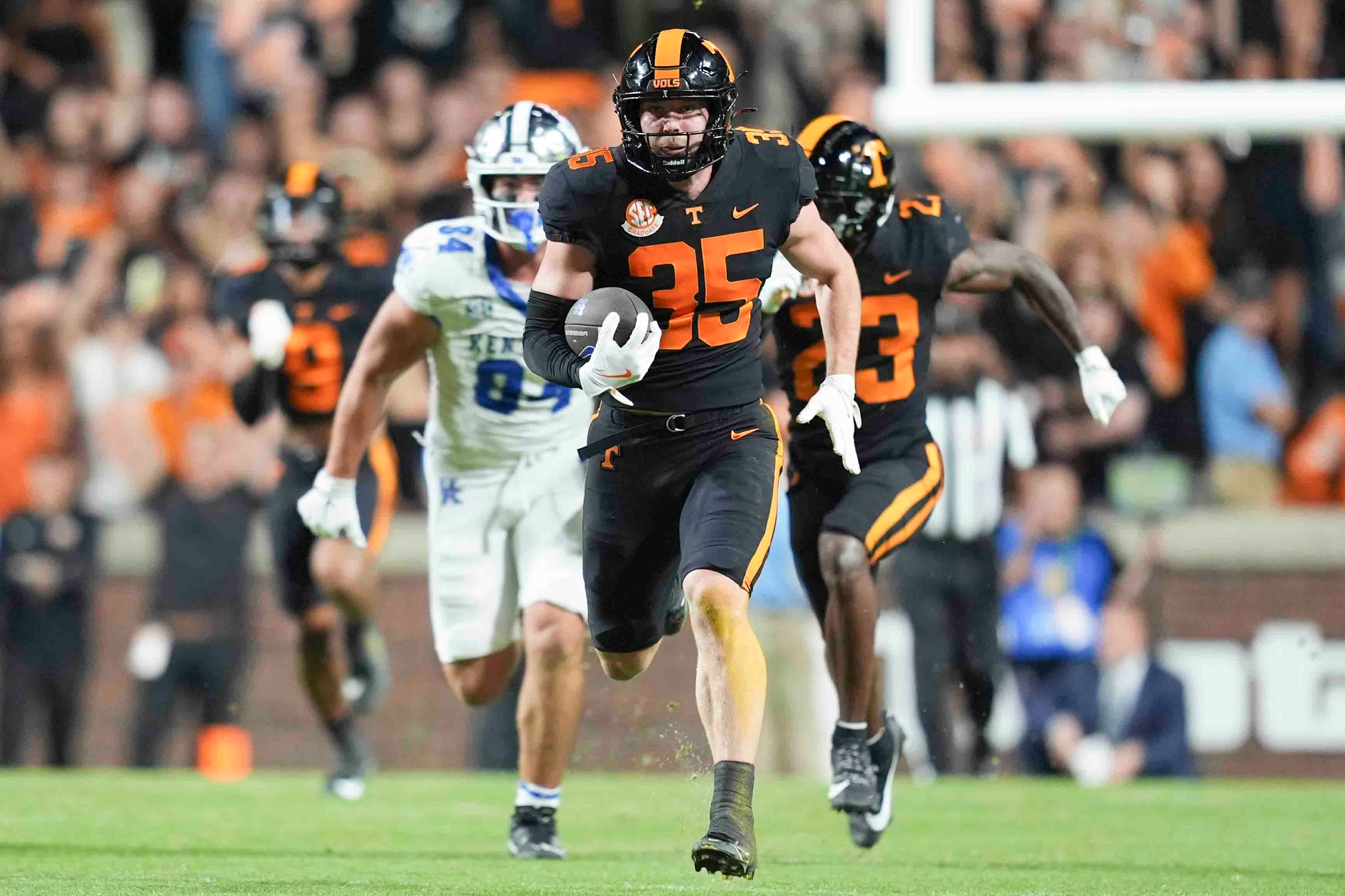 Tennessee defensive back Will Brooks (35) runs after intercepting a pass during a game between Tennessee and Kentucky at Neyland Stadium in Knoxville, Tenn., Saturday, Nov. 2, 2024.