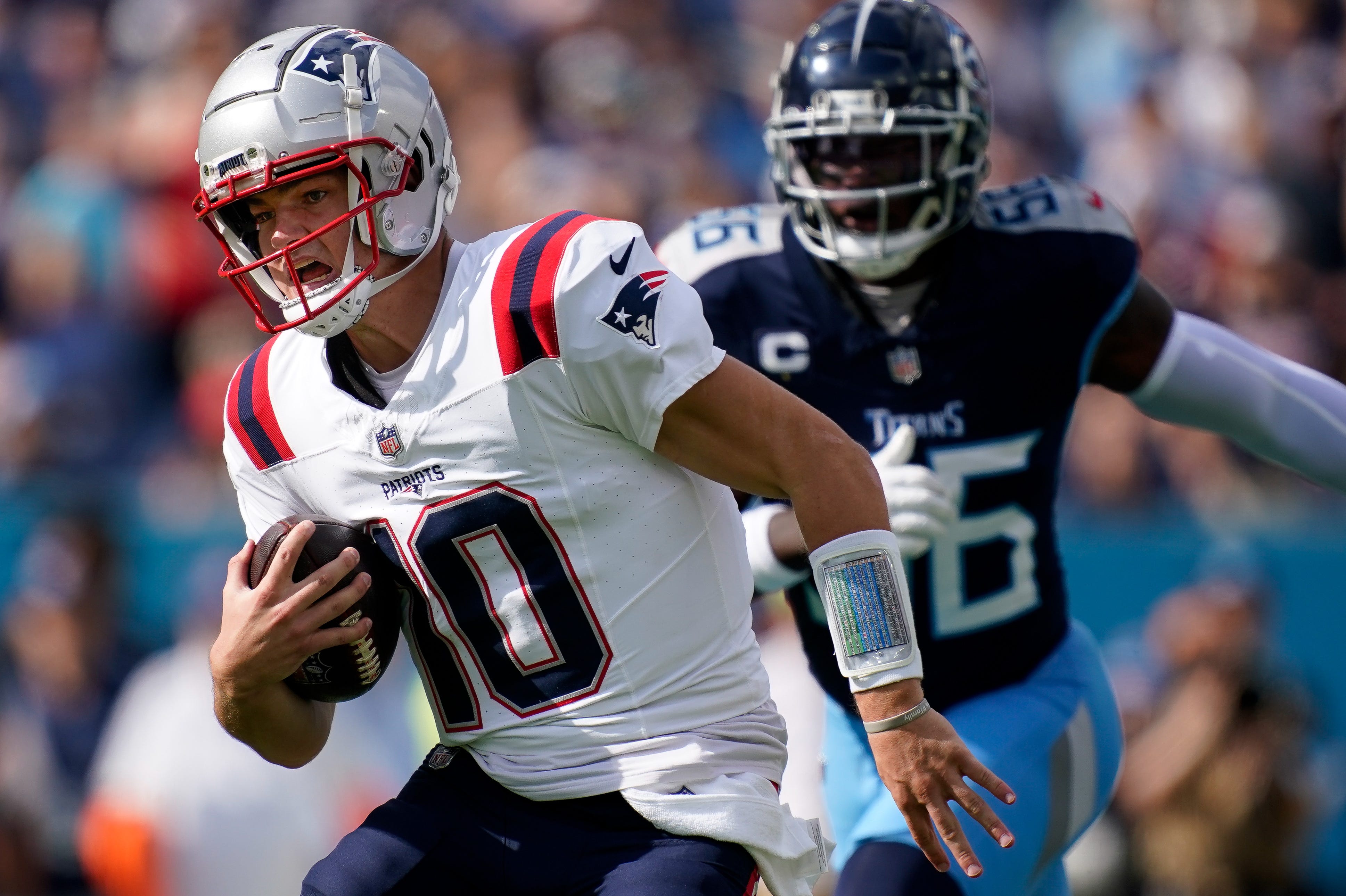 New England Patriots quarterback Drake Maye (10) runs the ball against the Tennessee Titans during the first quarter at Nissan Stadium in Nashville, Tenn., Sunday, Nov. 3, 2024.