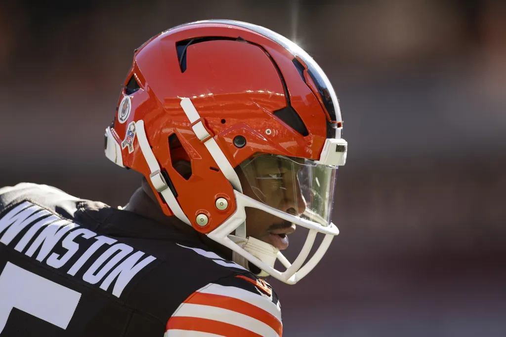 Cleveland Browns quarterback Jameis Winston (5) pumps up his teammates during warm ups before the game against the Los Angeles Chargers at Huntington Bank Field.