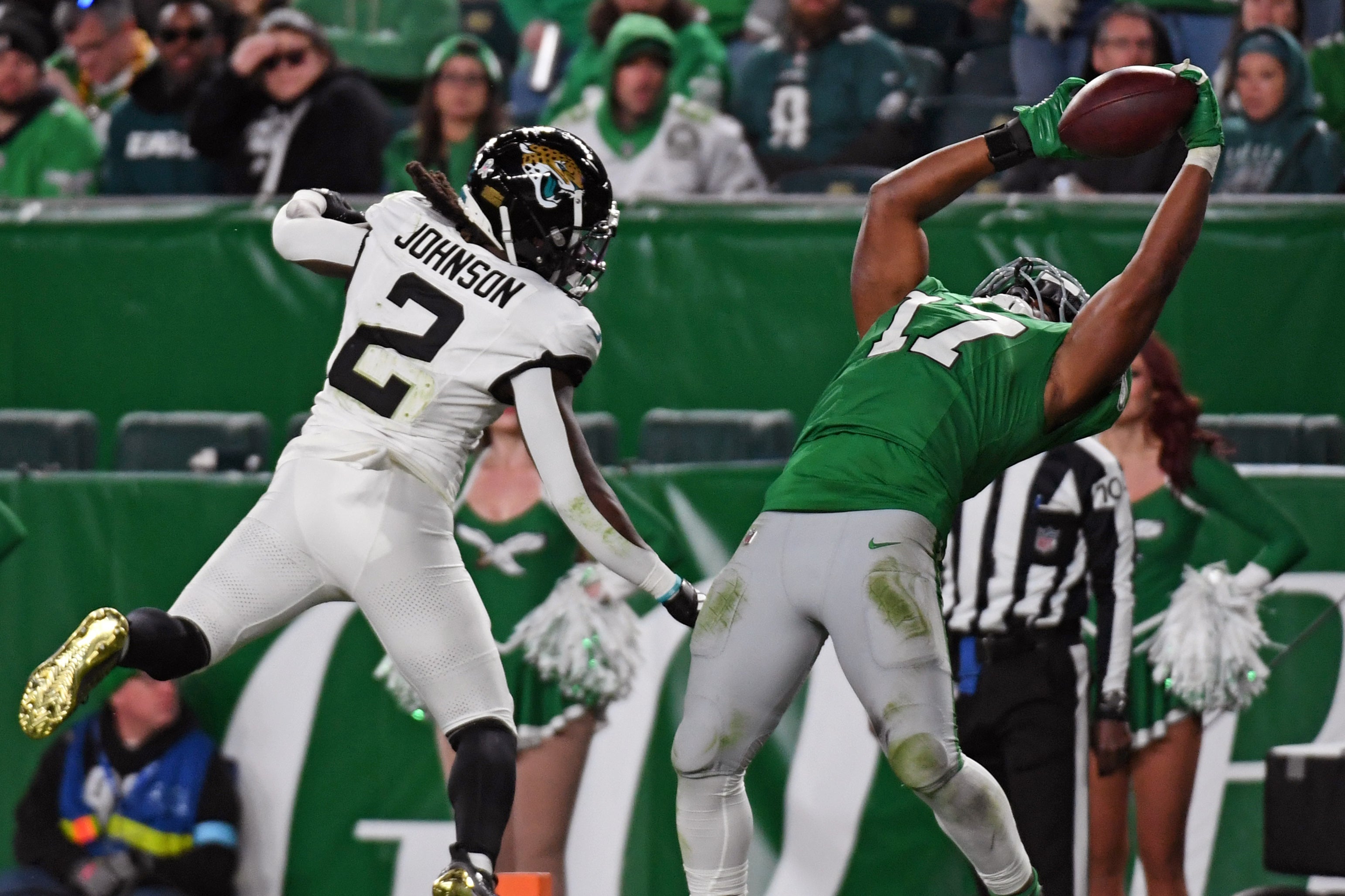 Philadelphia Eagles linebacker Nakobe Dean (17) intercepts pass in the end against Jacksonville Jaguars running back D'Ernest Johnson (2) during the fourth quarter at Lincoln Financial Field.