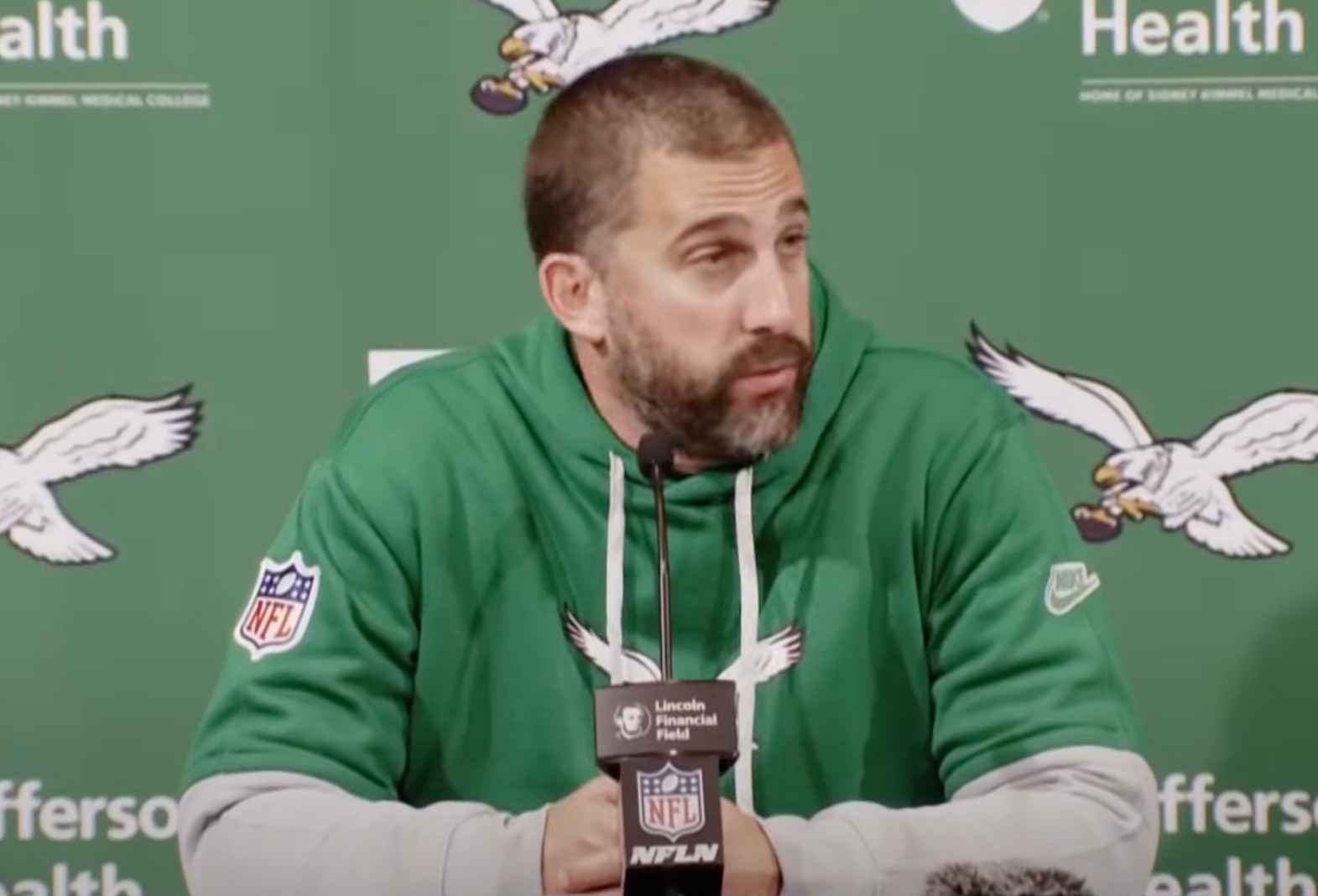 Philadelphia Eagles head coach Nick Sirianni reacts to running back Saquon Barkley's leap over Jacksonville Jaguars cornerback Jarrian Jones.