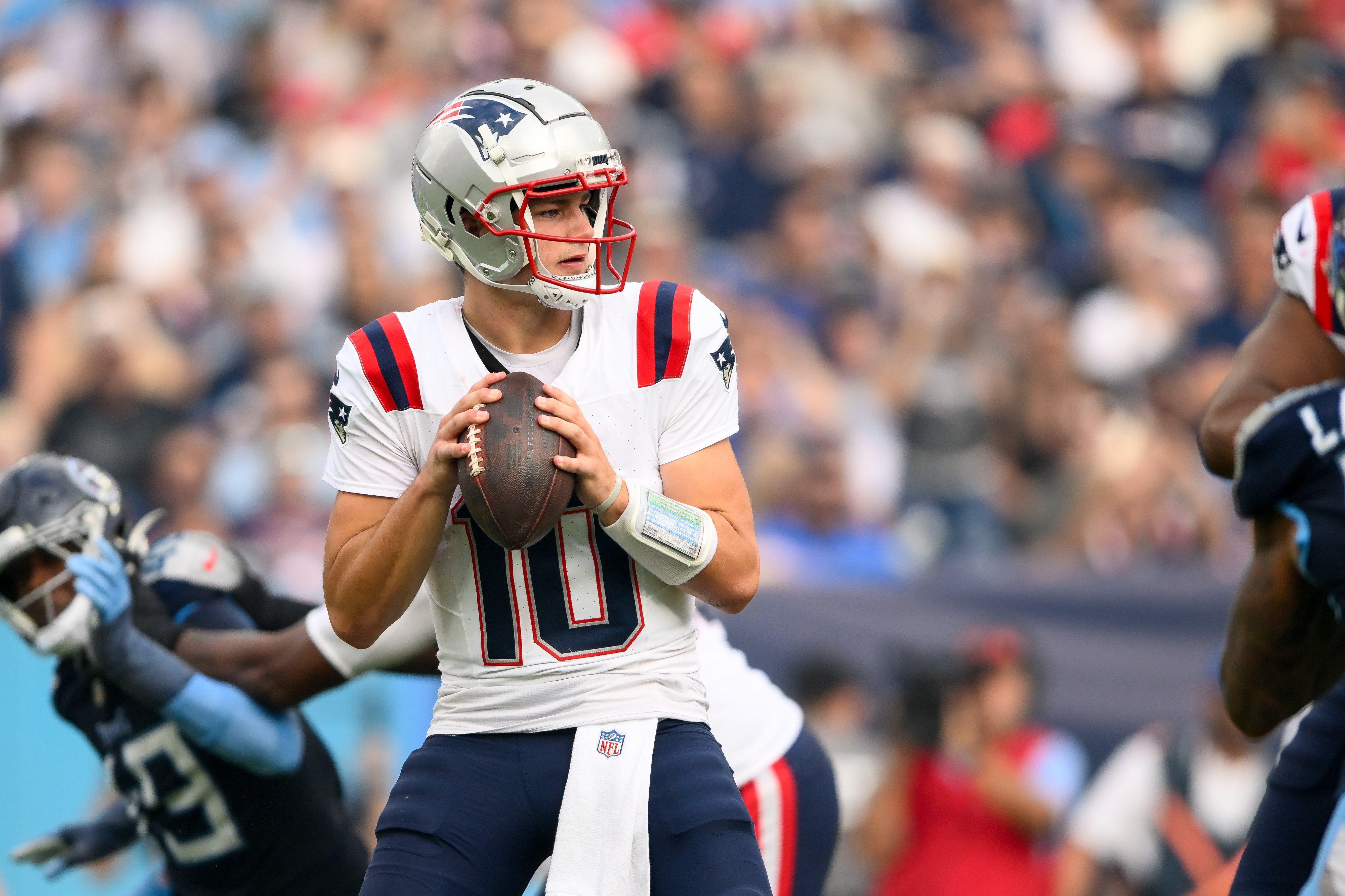 Nov 3, 2024; Nashville, Tennessee, USA; New England Patriots quarterback Drake Maye (10) stands in the pocket against the Tennessee Titans during the second half at Nissan Stadium.