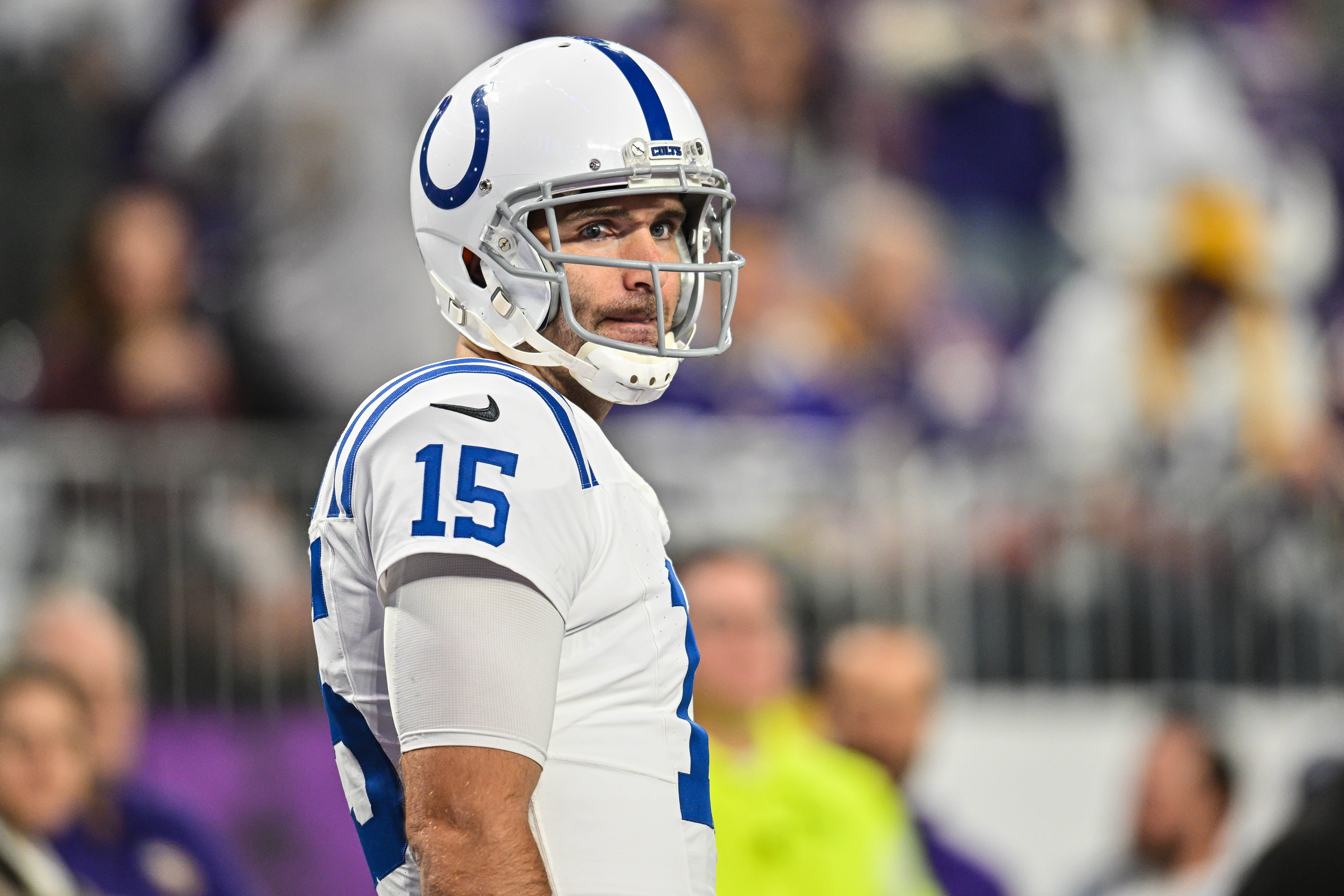 Nov 3, 2024; Minneapolis, Minnesota, USA; Indianapolis Colts quarterback Joe Flacco (15) looks on before the game against the Minnesota Vikings at U.S. Bank Stadium.