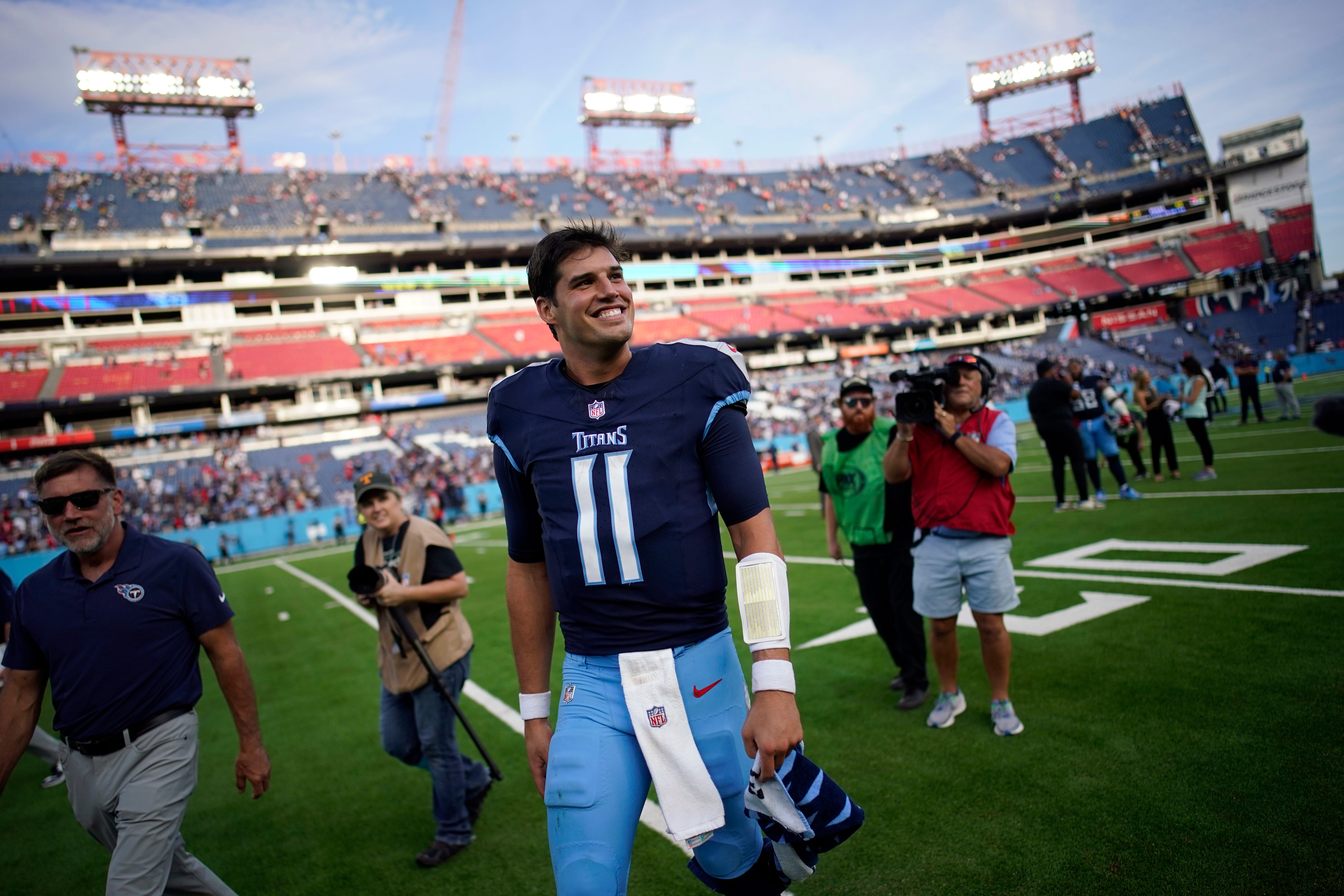 Tennessee Titans quarterback Mason Rudolph (11) leaves the field after a 20-17 victory over New England at Nissan Stadium in Nashville, Tenn., Sunday, Nov. 3, 2024.