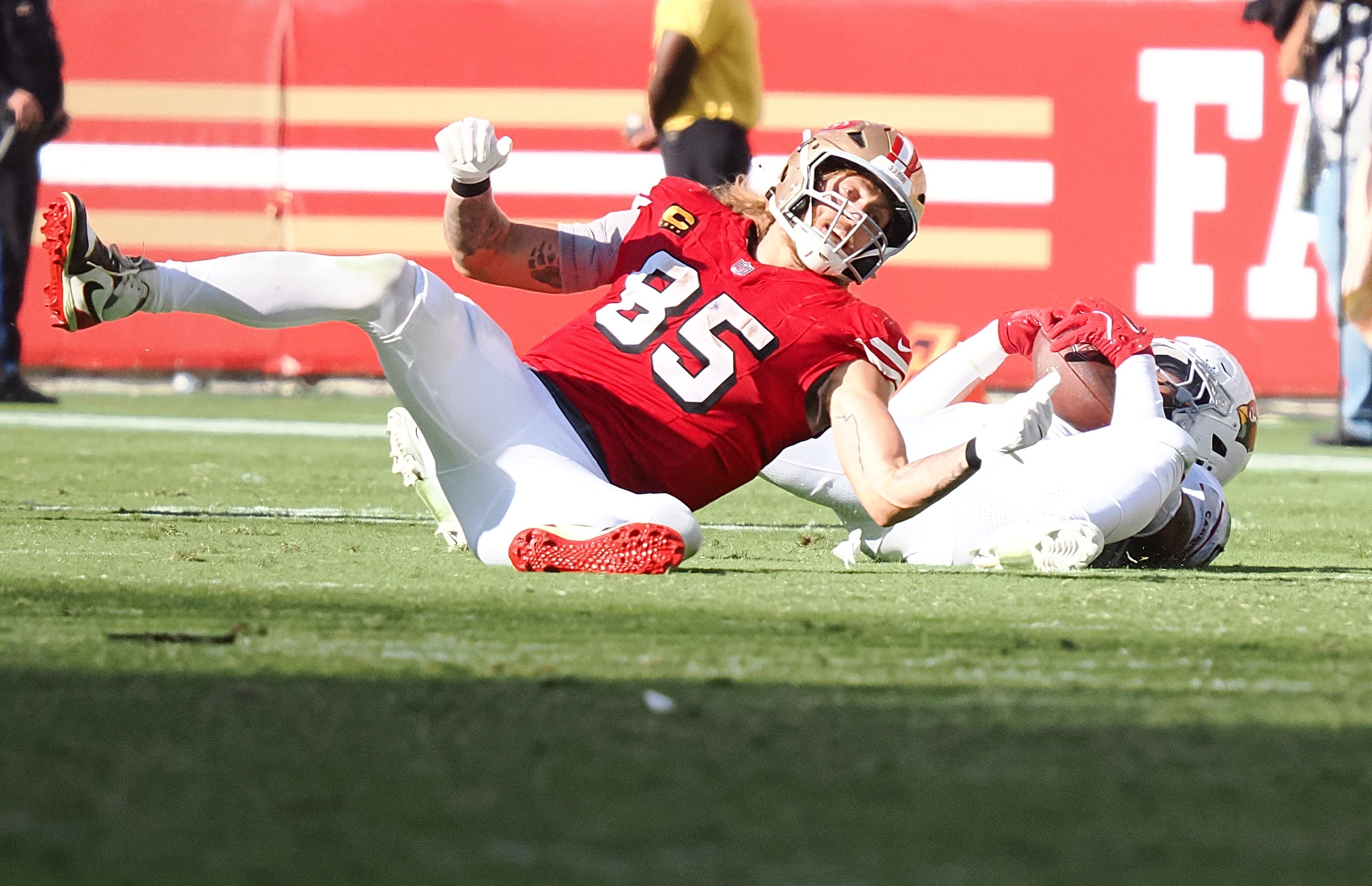 Arizona Cardinals linebacker Kyzir White (7) intercepts the pass intended for San Francisco 49ers tight end George Kittle (85) during the fourth quarter at Levi's Stadium.