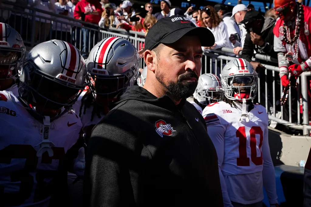 Ohio State Buckeyes head coach Ryan Day leads his team onto the field for the NCAA football game against the Penn State Nittany Lions at Beaver Stadium in University Park, Pa. on Monday, Nov. 4, 2024