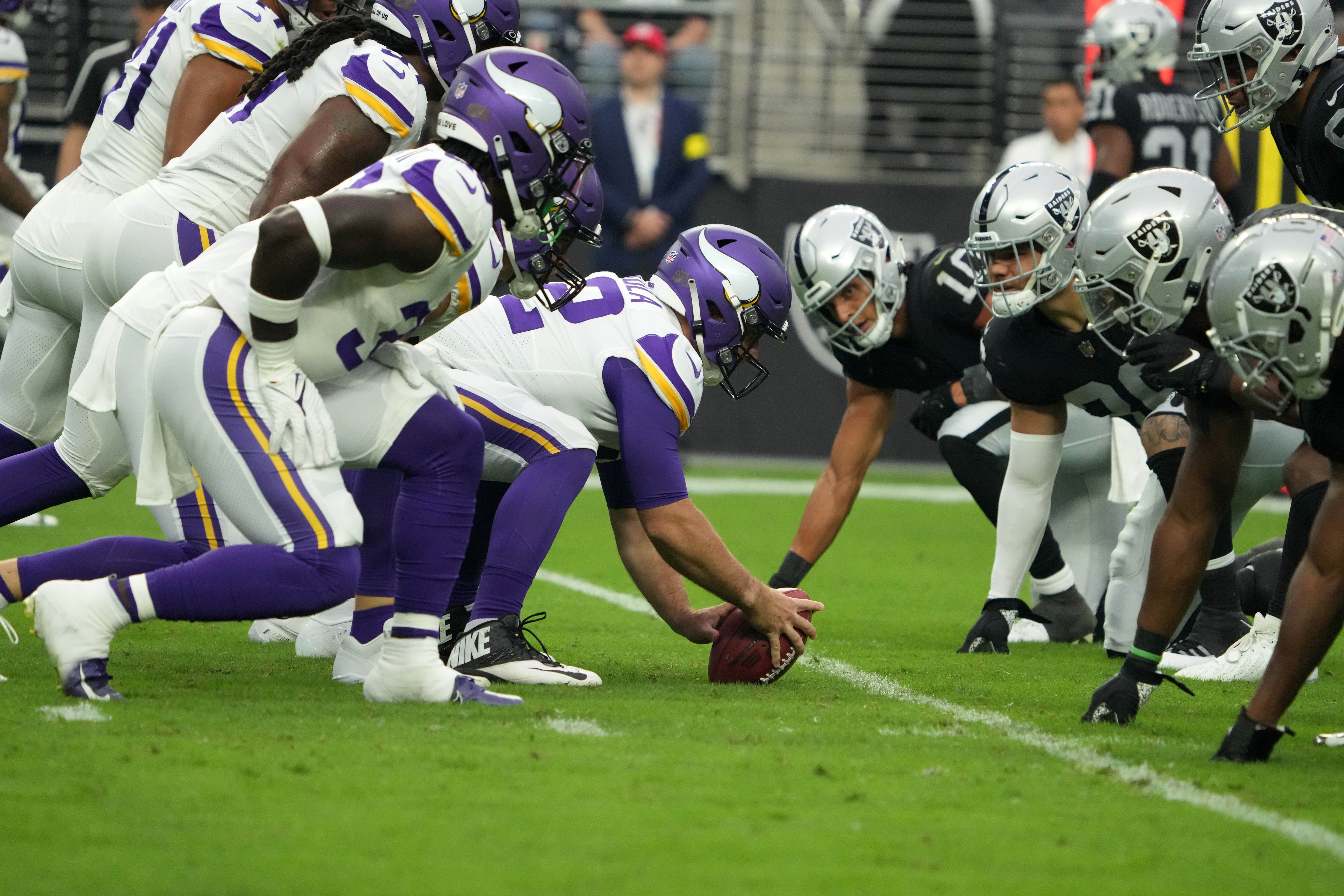 Aug 14, 2022; Paradise, Nevada, USA; A general view of the line of scrimmage as Minnesota Vikings long snapper Andrew DePaola (42) snaps the ball against the Las Vegas Raiders at Allegiant Stadium.