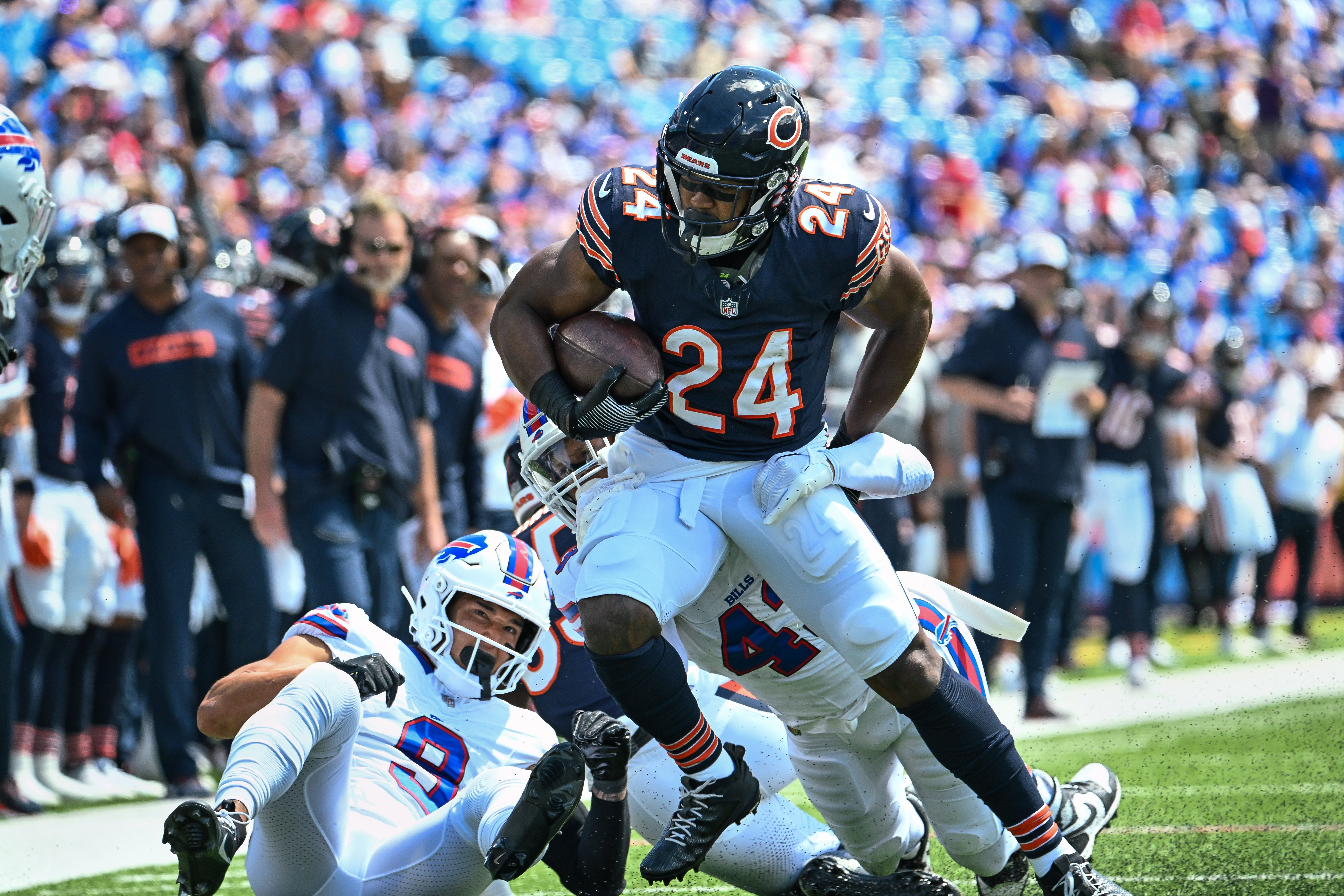 Aug 10, 2024; Orchard Park, New York, USA; Chicago Bears running back Khalil Herbert (24) carries the ball against the Buffalo Bills in the first quarter of a pre-season game at Highmark Stadium.