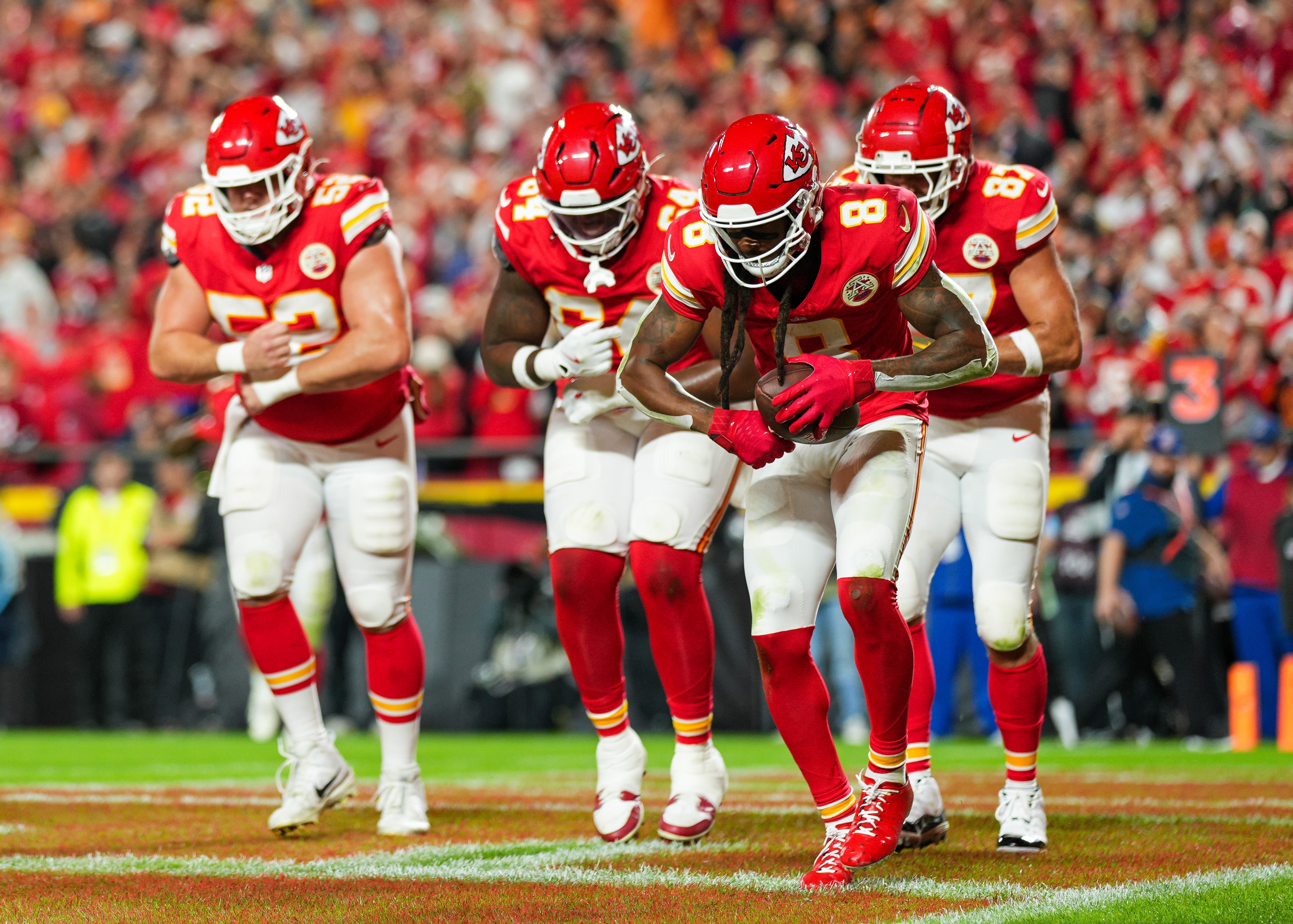 Nov 4, 2024; Kansas City, Missouri, USA; Kansas City Chiefs wide receiver DeAndre Hopkins (8) celebrates with teammates after scoring a touchdown during the first half against the Tampa Bay Buccaneers at GEHA Field at Arrowhead Stadium.