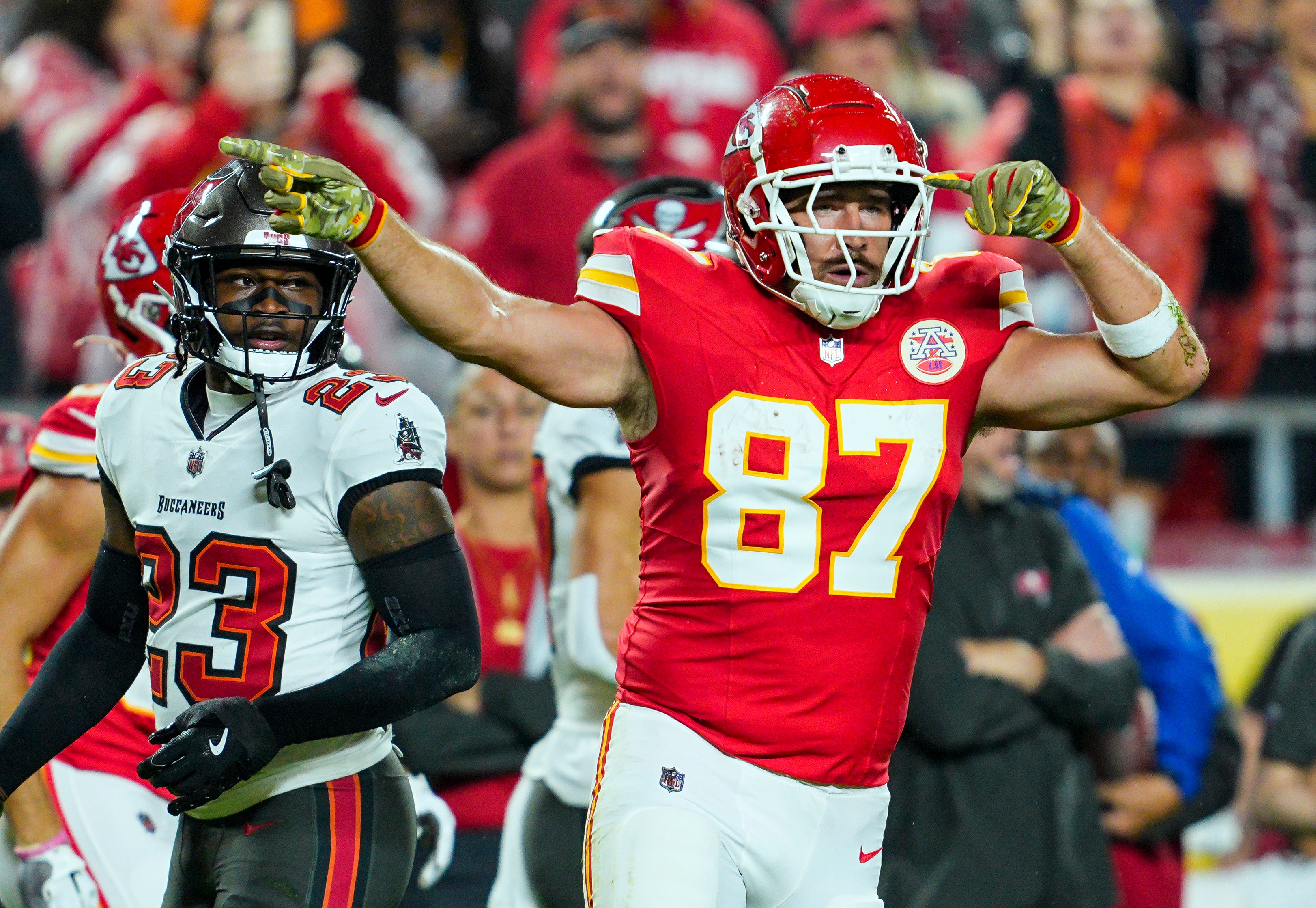 Chiefs TE Travis Kelce celebrates after a first down during the first half against the Buccaneers.
