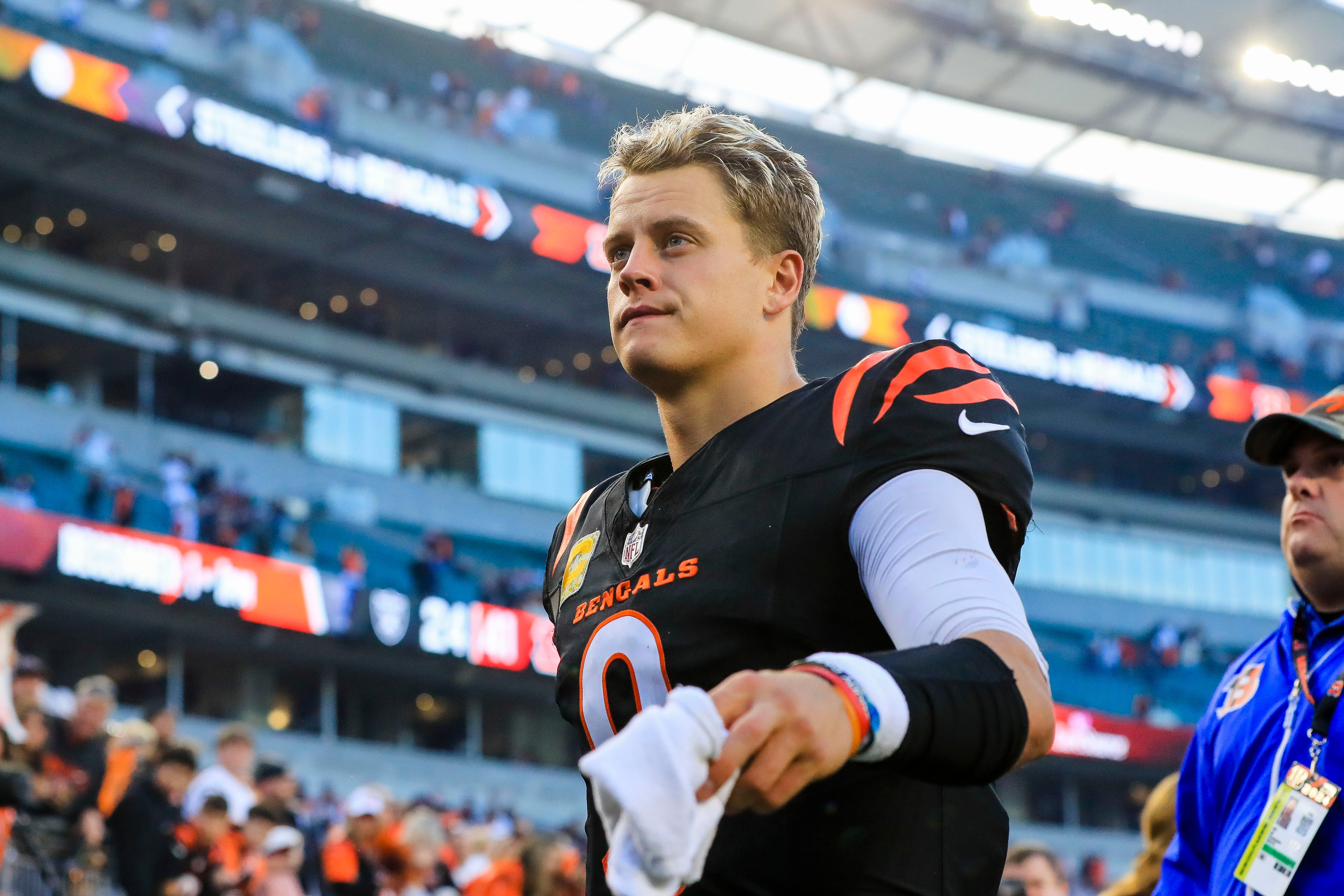 Nov 3, 2024; Cincinnati, Ohio, USA; Cincinnati Bengals quarterback Joe Burrow (9) walks off the field after the victory over the Las Vegas Raiders at Paycor Stadium.