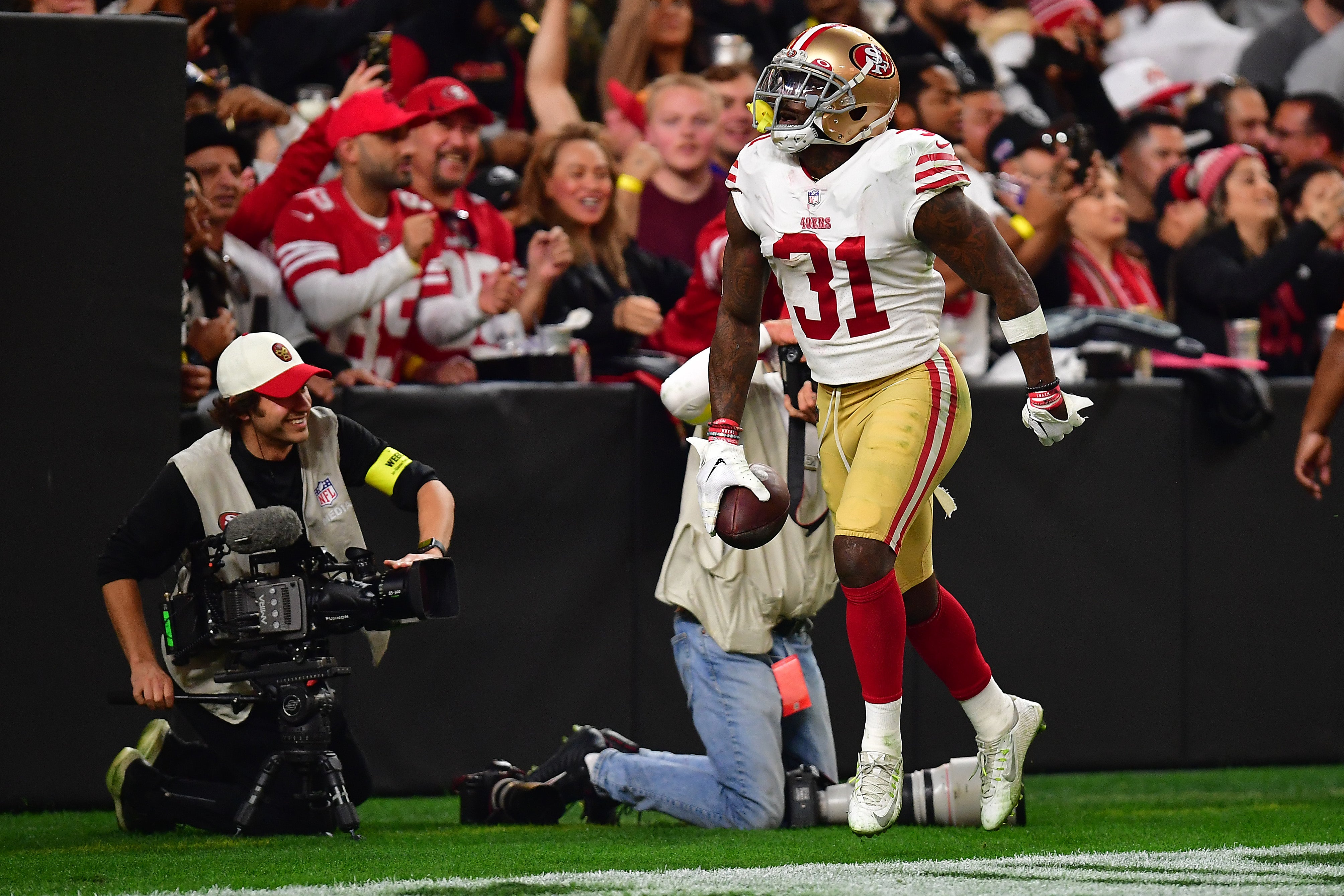 San Francisco 49ers safety Tashaun Gipson Sr. (31) celebrates his interception against Las Vegas Raiders quarterback Jarrett Stidham (3) during overtime at Allegiant Stadium.