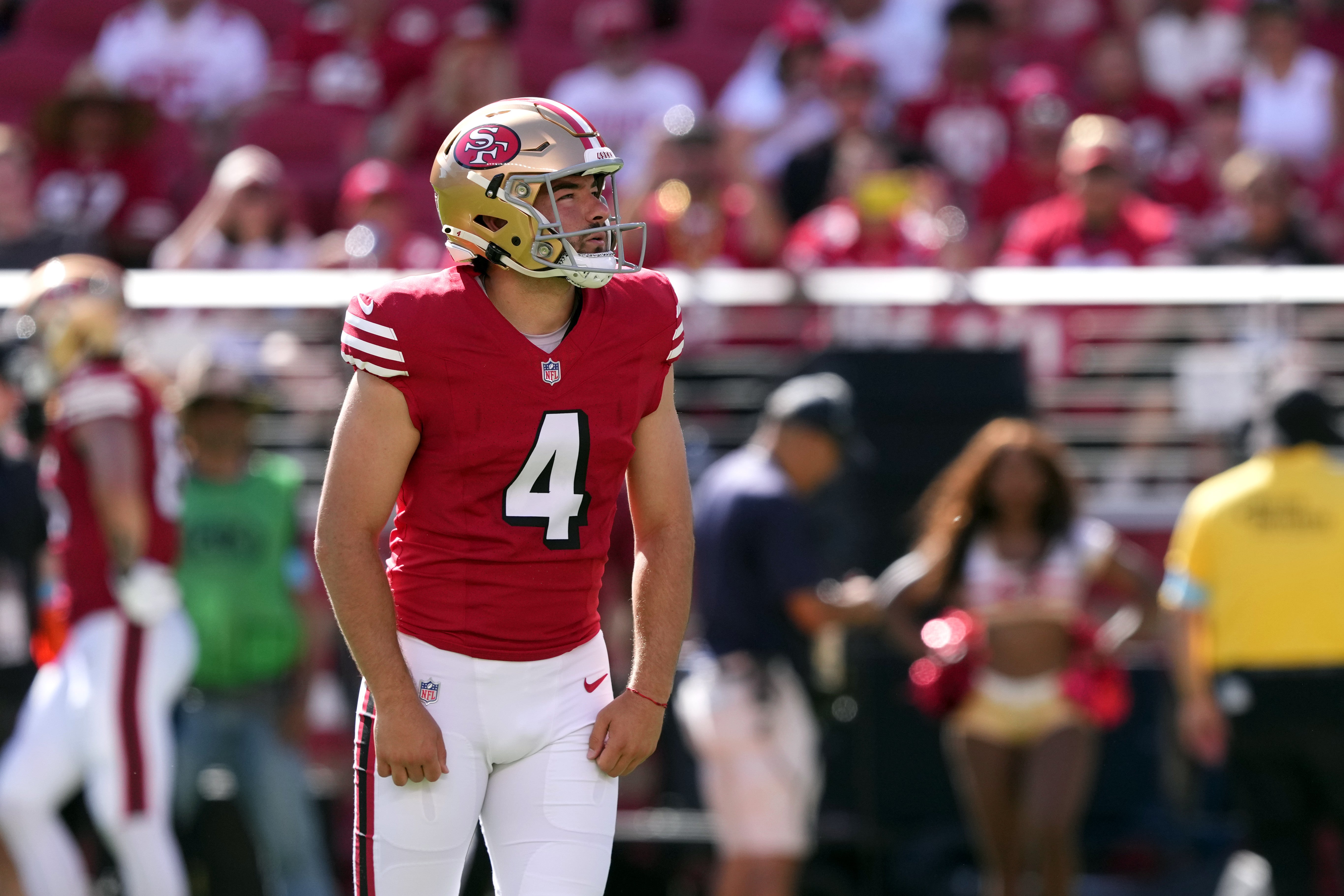 San Francisco 49ers place kicker Jake Moody (4) prepares to kick a field goal against the Arizona Cardinals during the second quarter at Levi's Stadium.