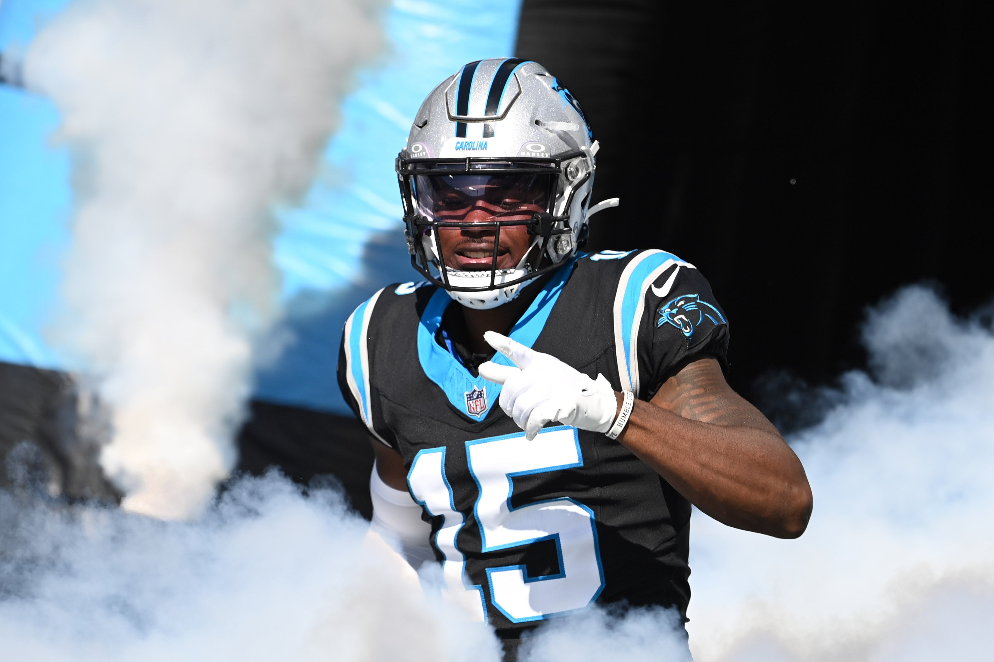 Carolina Panthers wide receiver Jonathan Mingo (15) runs on to the field at Bank of America Stadium.