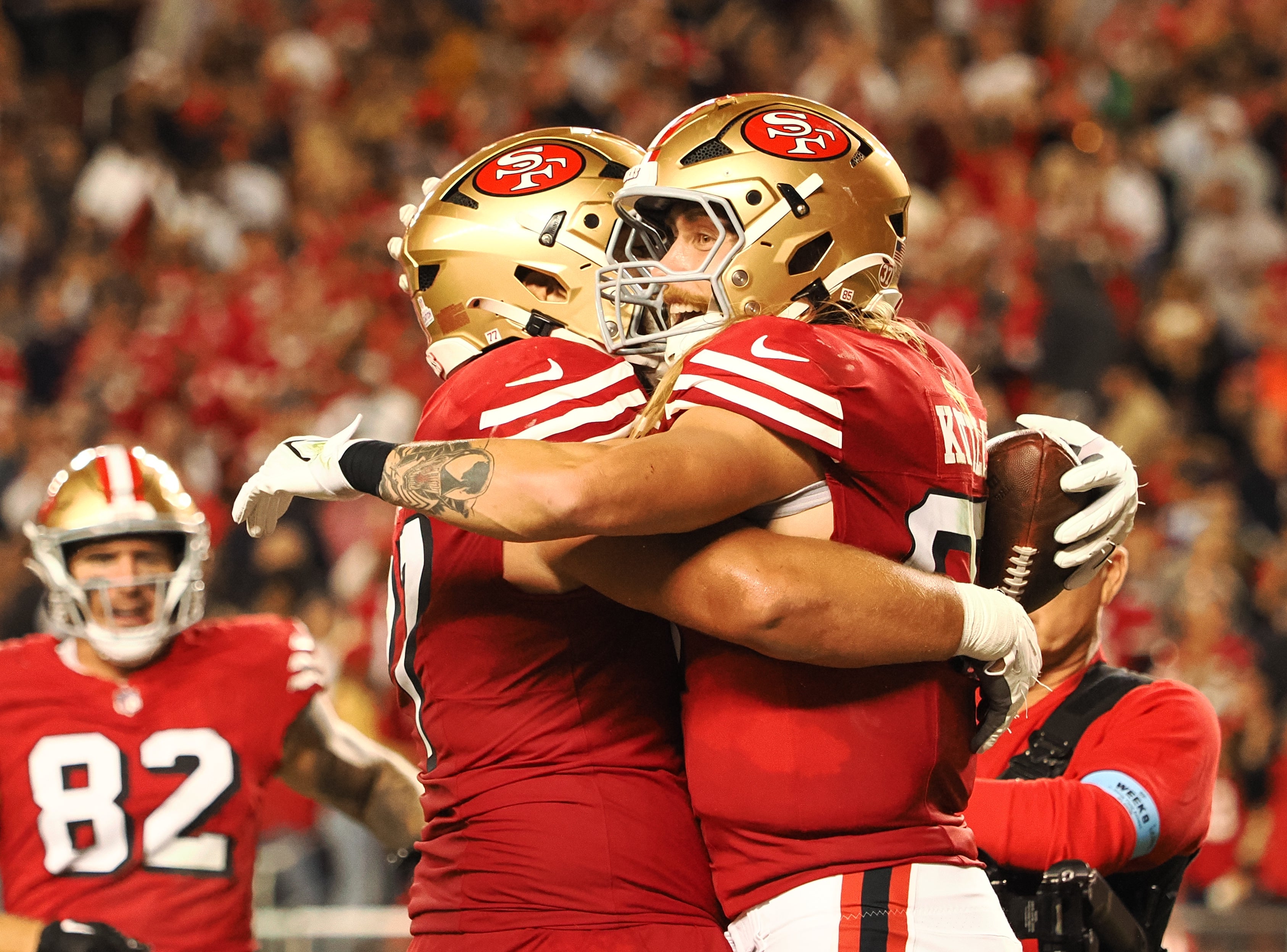San Francisco 49ers tight end George Kittle (85) celebrates after scoring a touchdown against the Dallas Cowboys during the third quarter at Levi's Stadium.
