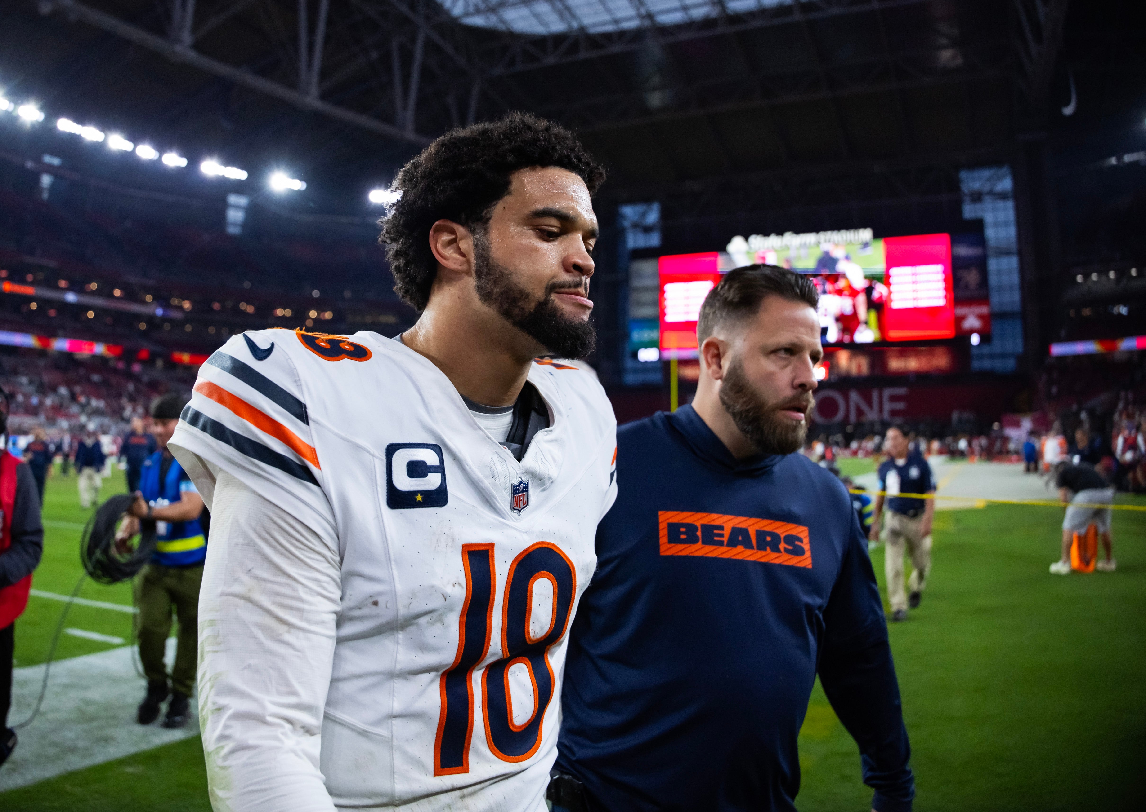 Nov 3, 2024; Glendale, Arizona, USA; Chicago Bears quarterback Caleb Williams (18) reacts following the game against the Arizona Cardinals at State Farm Stadium.