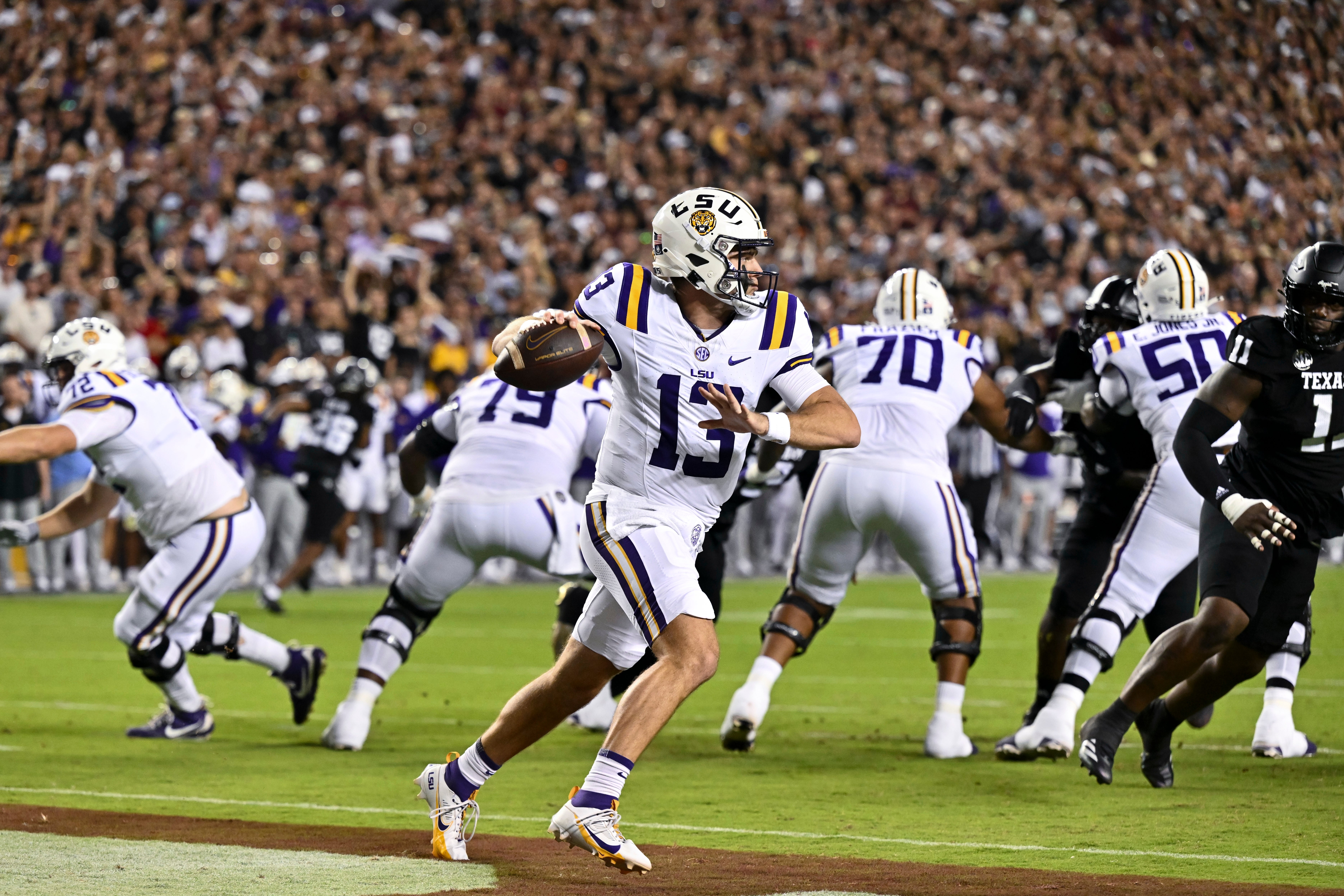 Oct 26, 2024; College Station, Texas, USA; LSU Tigers quarterback Garrett Nussmeier (13) passes the ball during the second quarter against the Texas A&M Aggies. The Aggies defeated the Tigers 38-23; at Kyle Field.