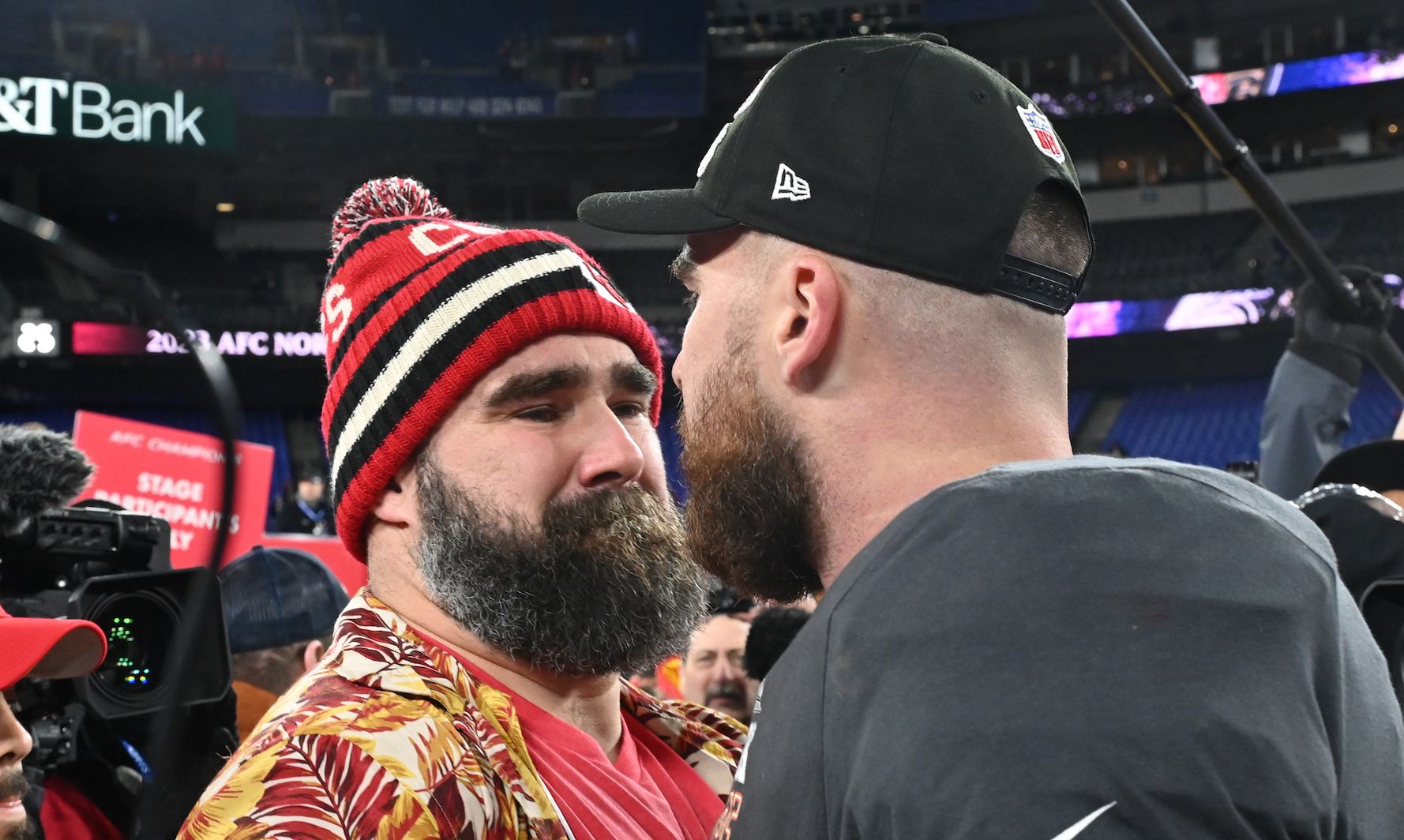Jan 28, 2024; Baltimore, Maryland, USA; Kansas City Chiefs tight end Travis Kelce (87) celebrates with Jason Kelce (center) after the Kansas City Chiefs won the AFC Championship football game against the Baltimore Ravens at M&T Bank Stadium.