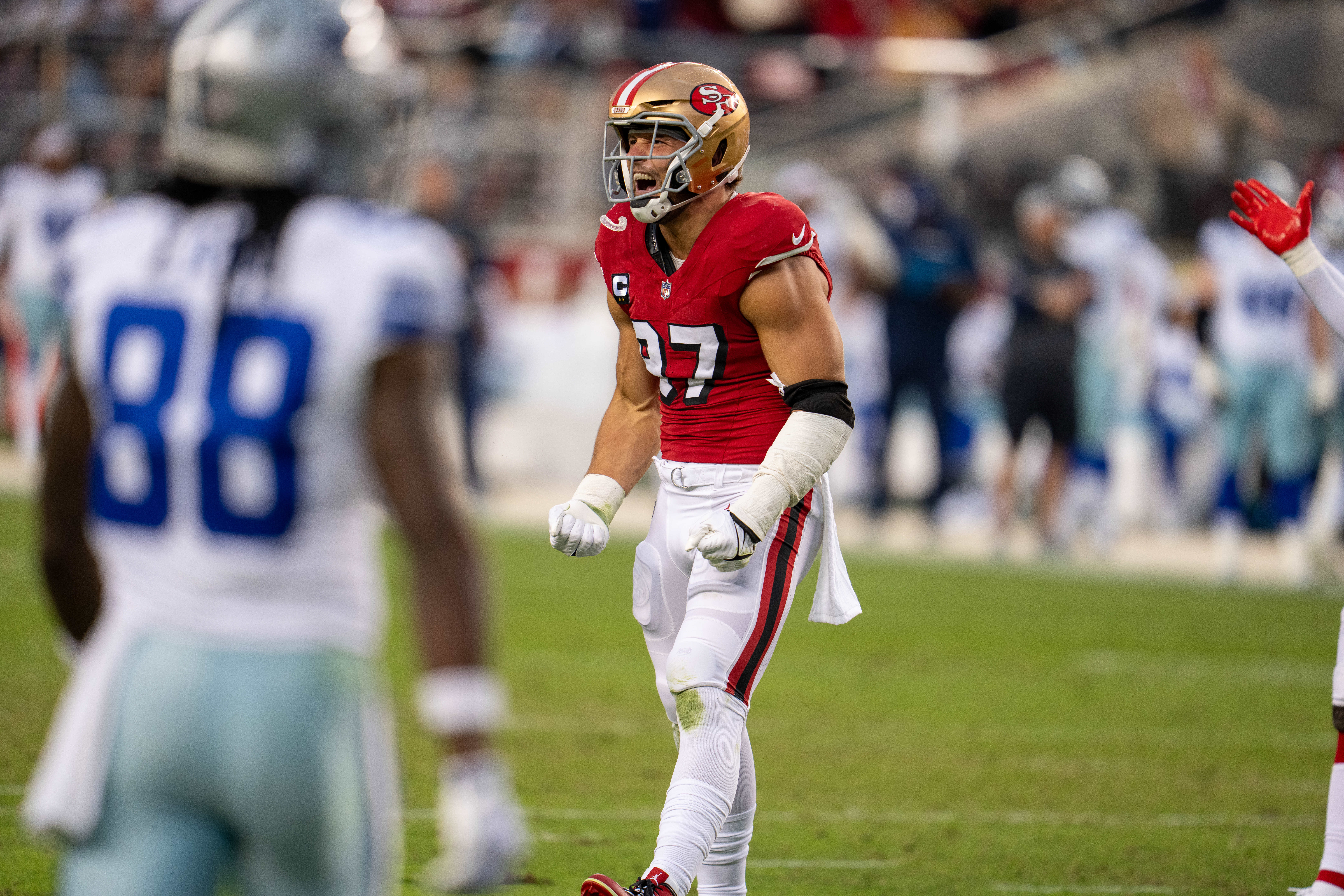 San Francisco 49ers defensive end Nick Bosa (97) celebrates after the sack of Dallas Cowboys quarterback Dak Prescott (not pictured) during the second quarter at Levi's Stadium.
