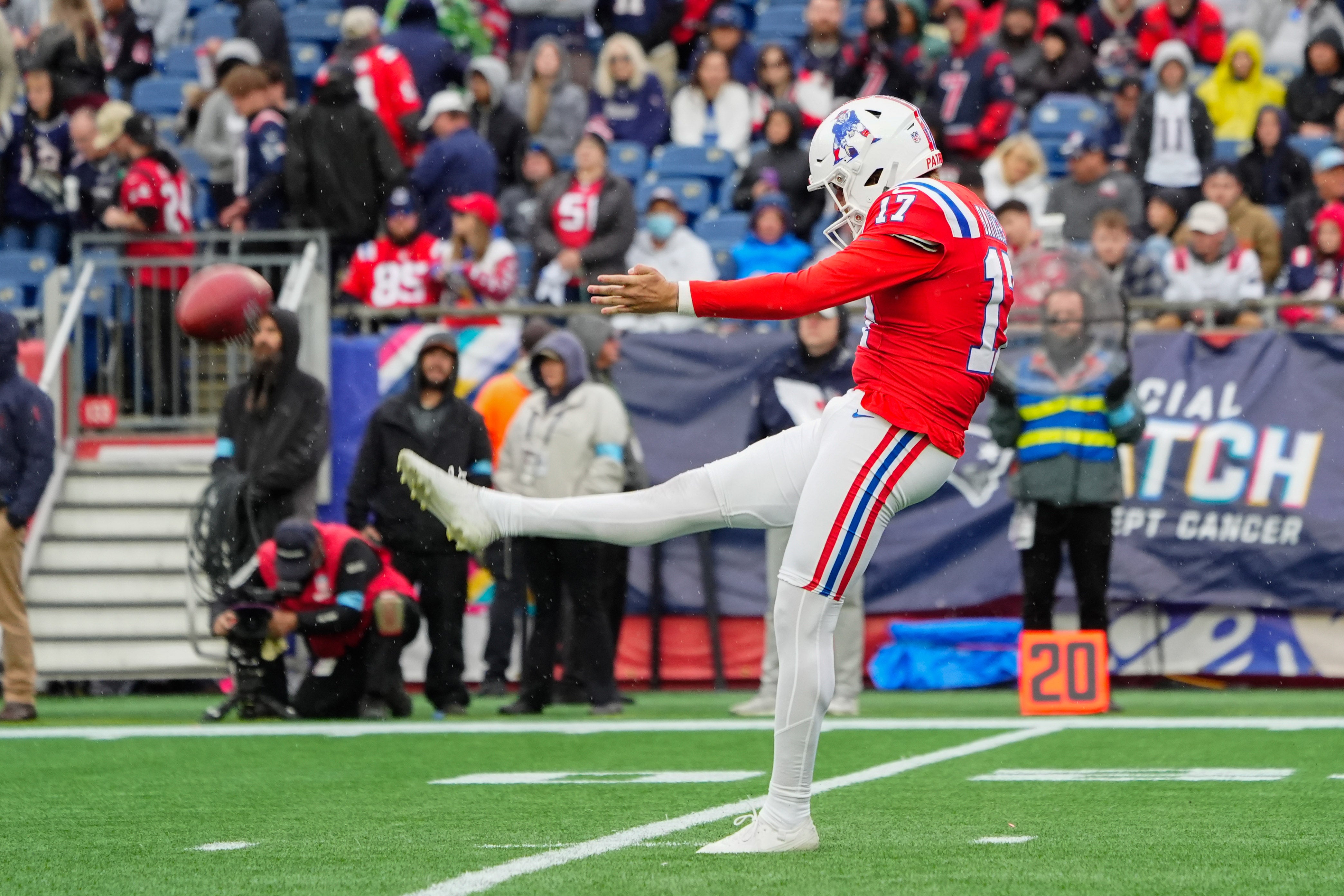 Oct 13, 2024; Foxborough, Massachusetts, USA; New England Patriots punter Bryce Baringer (17) punts the ball against the Houston Texans during the second half at Gillette Stadium.