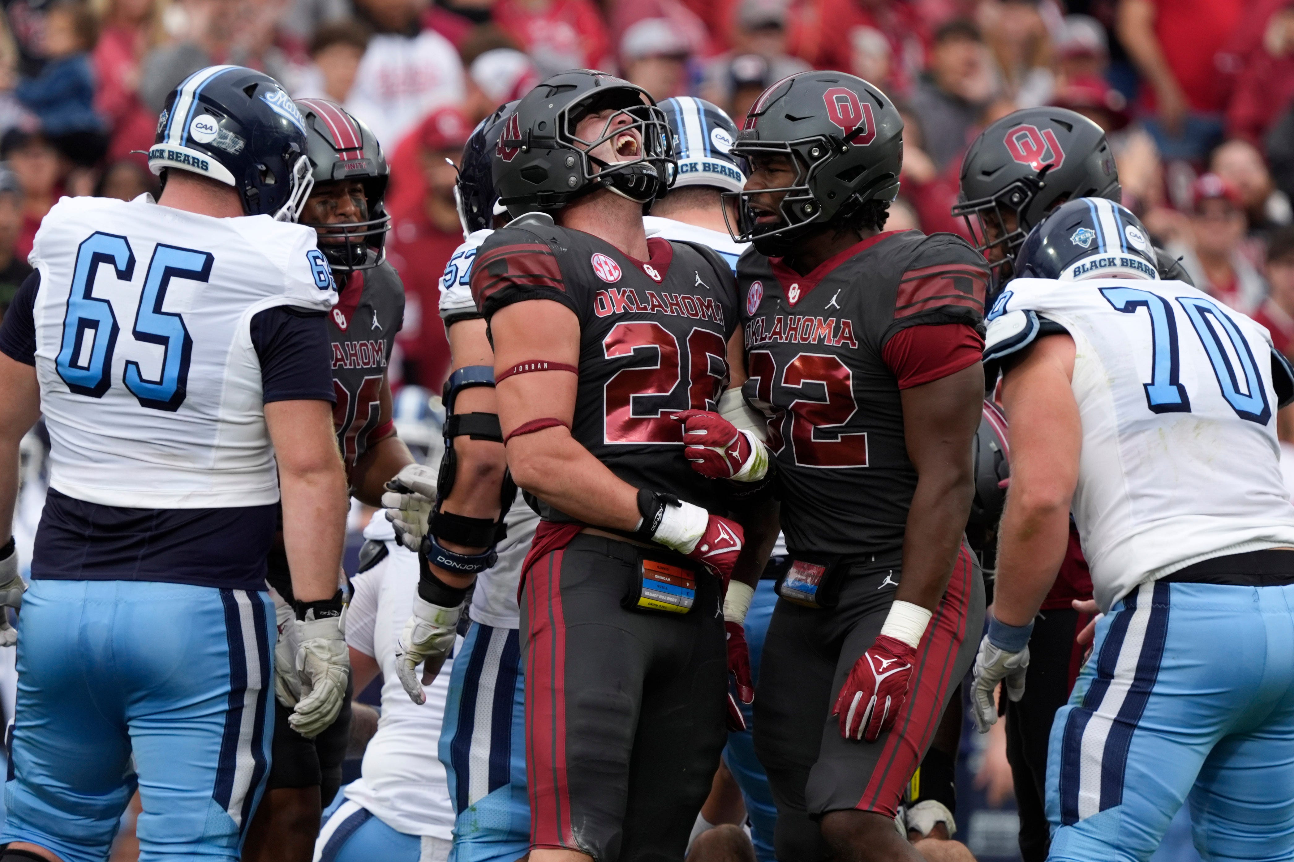 Oklahoma Sooners linebacker Danny Stutsman (28) and Oklahoma Sooners defensive back Peyton Bowen (22) celebrate during a college football game between the University of Oklahoma Sooners (OU) and the Maine Black Bears at Gaylord Family - Oklahoma Memorial Stadium in Norman, Okla., Saturday, Nov. 2, 2024.