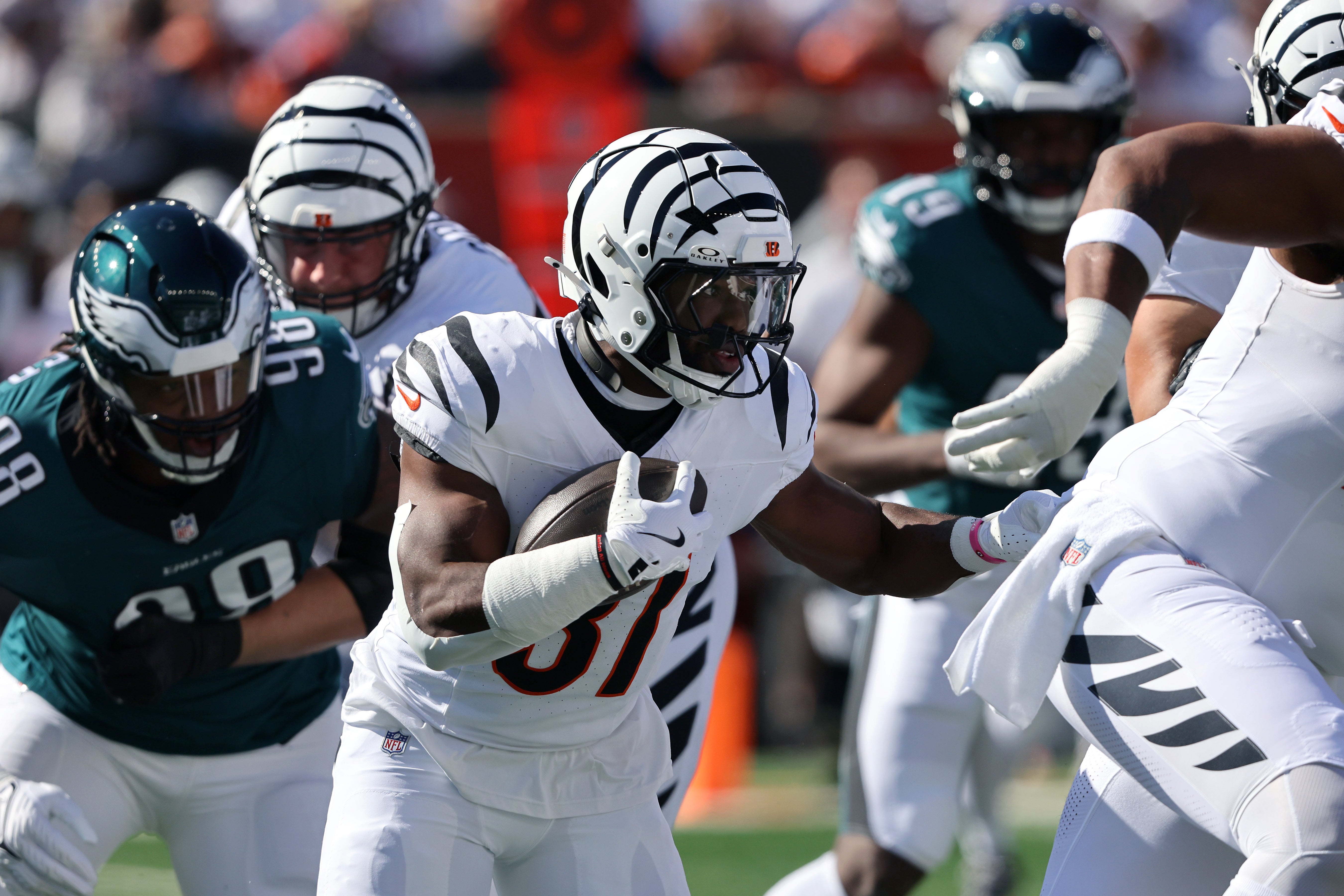 Oct 27, 2024; Cincinnati, Ohio, USA; Cincinnati Bengals running back Zack Moss (31) runs the ball during the first quarter against the Philadelphia Eagles at Paycor Stadium.