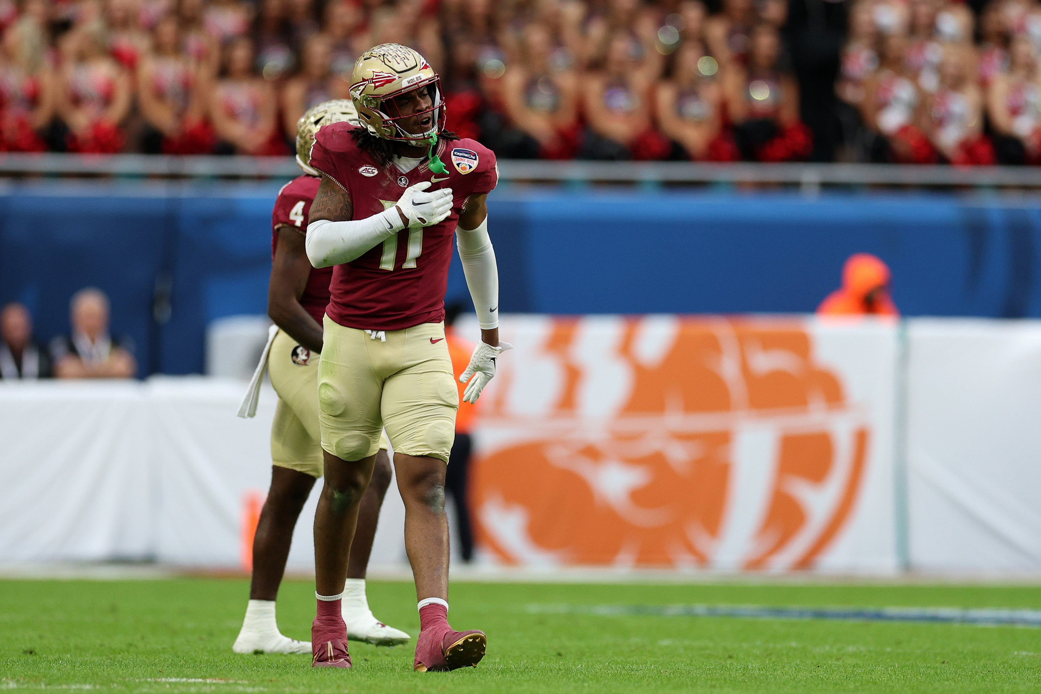 Florida State Seminoles defensive lineman Patrick Payton (11) reacts against the Georgia Bulldogs during the first half in the 2023 Orange Bowl at Hard Rock Stadium.