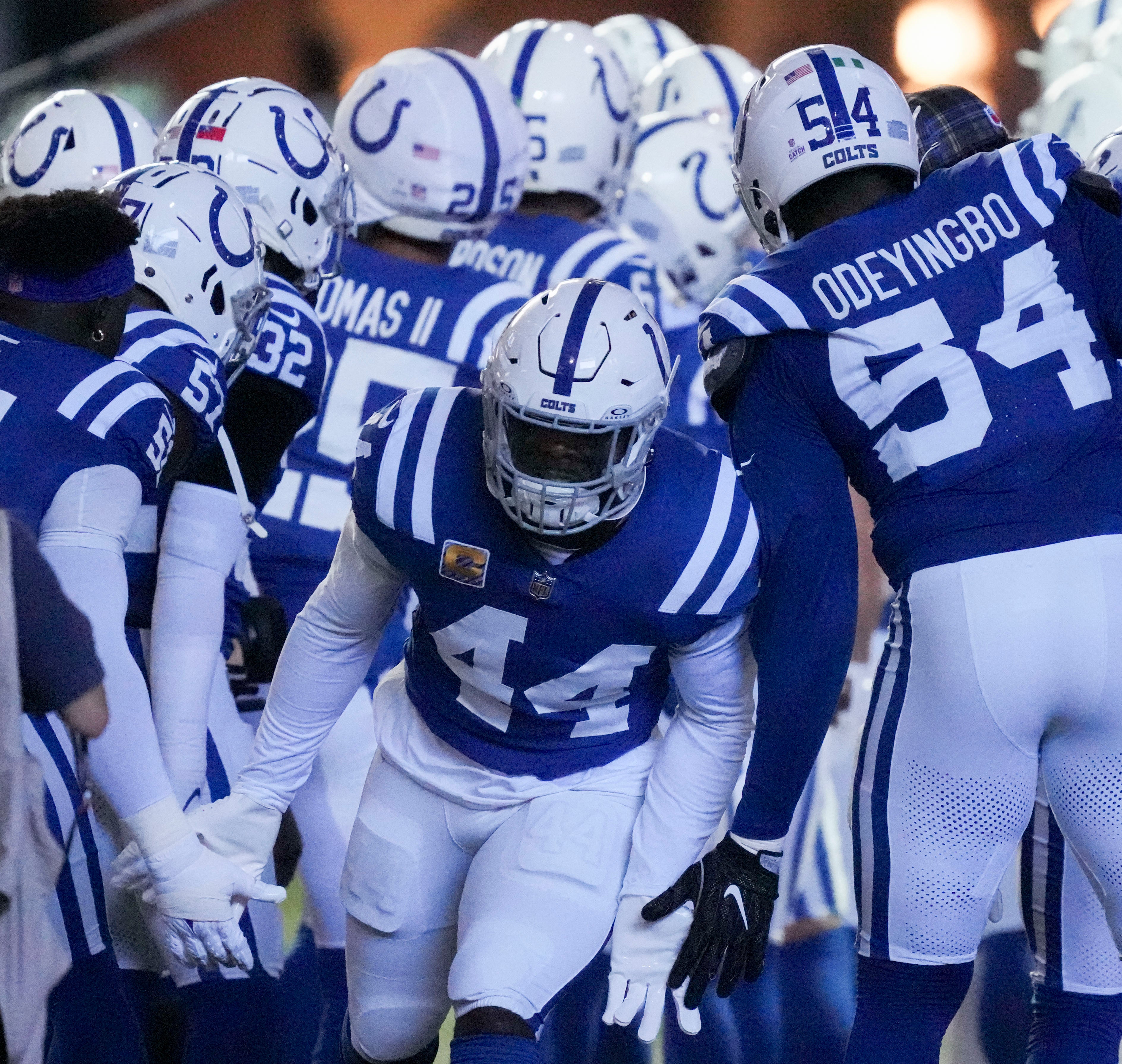 Oct 20, 2024; Indianapolis, Indiana, USA; Indianapolis Colts linebacker Zaire Franklin (44) high fives his teammates as he takes the field during a game against the Miami Dolphins at Lucas Oil Stadium.
