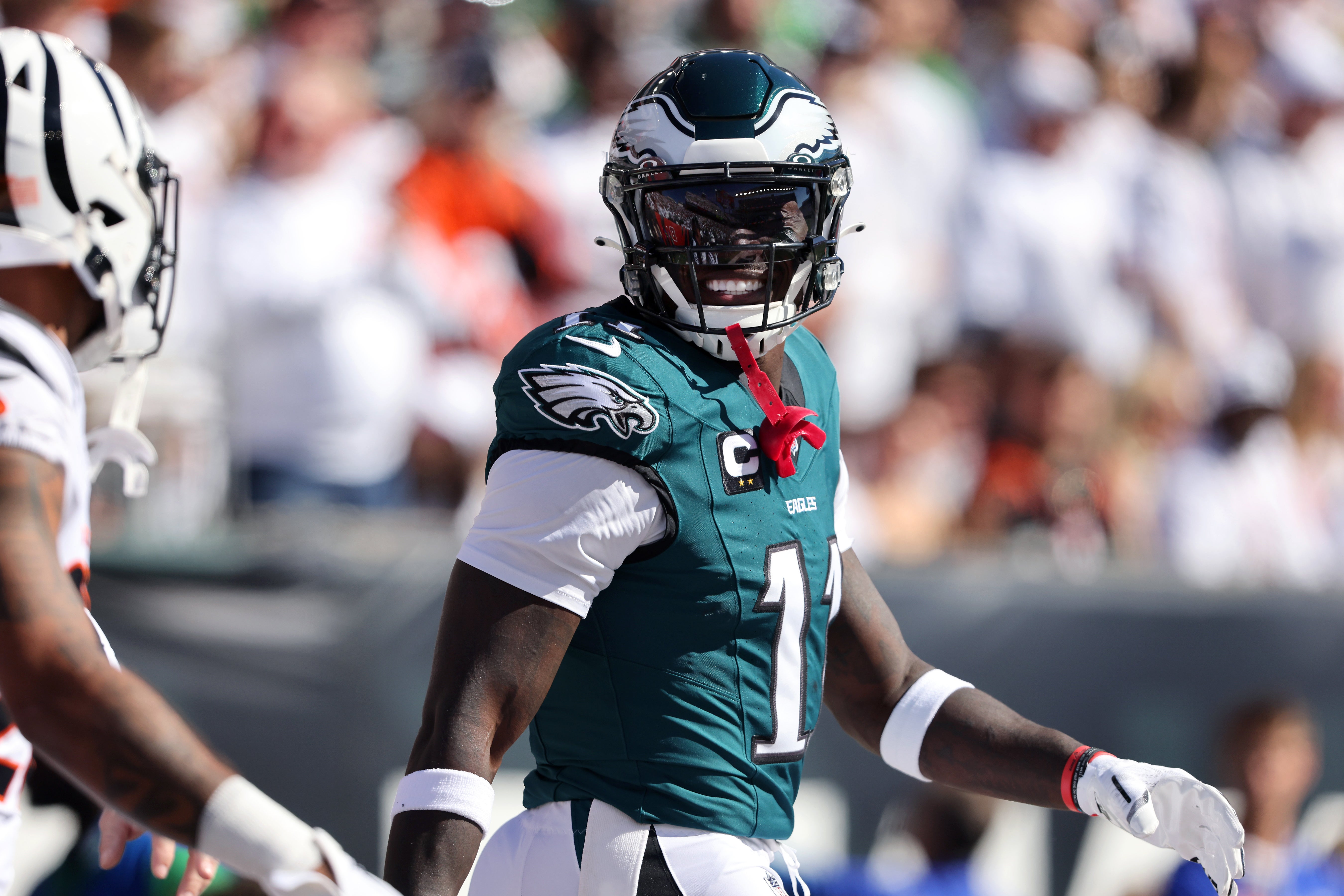 Philadelphia Eagles wide receiver A.J. Brown (11) exchanges words with Cincinnati Bengals players during the first quarter at Paycor Stadium.