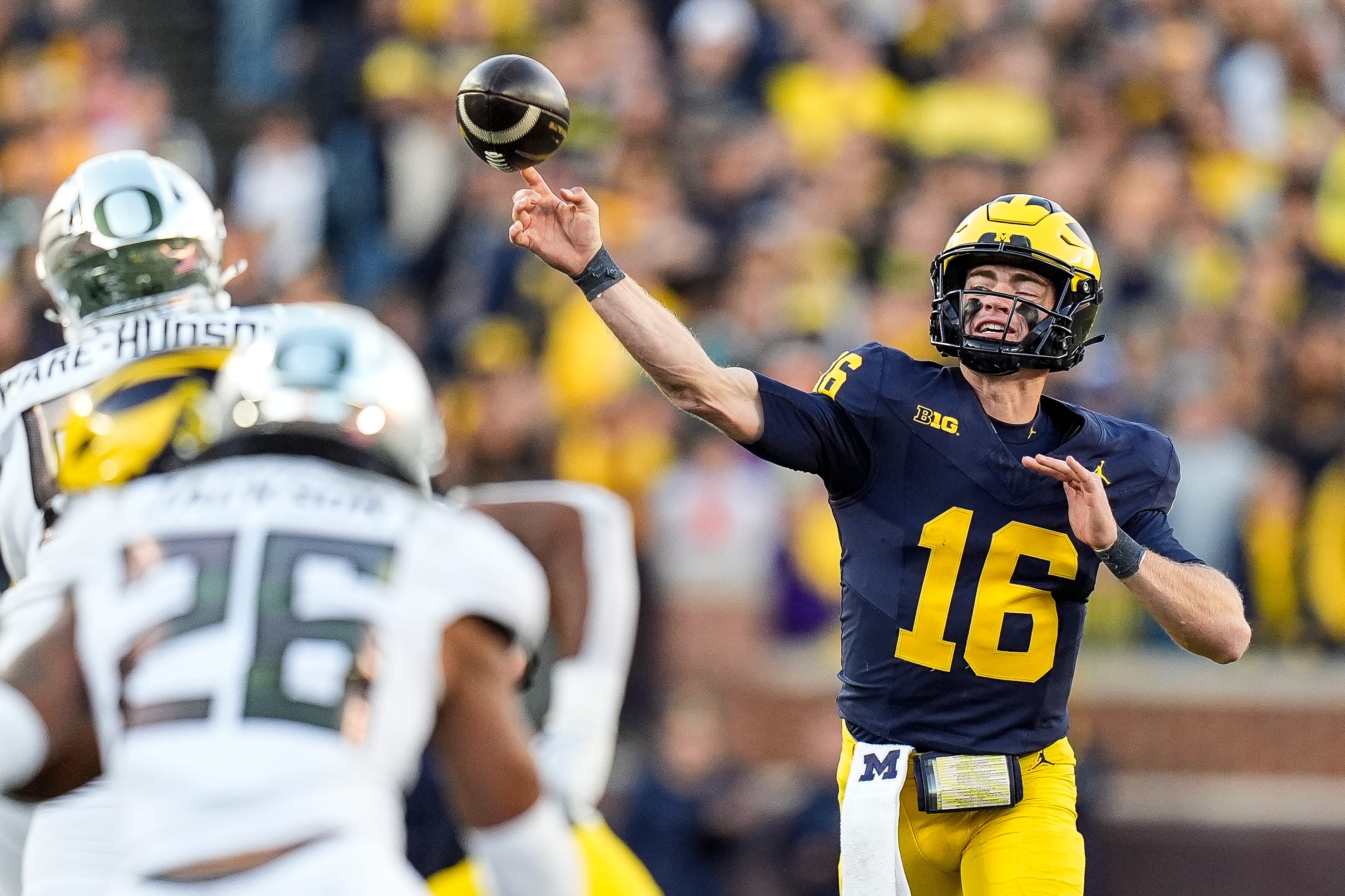 Michigan quarterback Davis Warren (16) makes a pass against Oregon during the second half at Michigan Stadium in Ann Arbor on Saturday, Nov. 2, 2024.