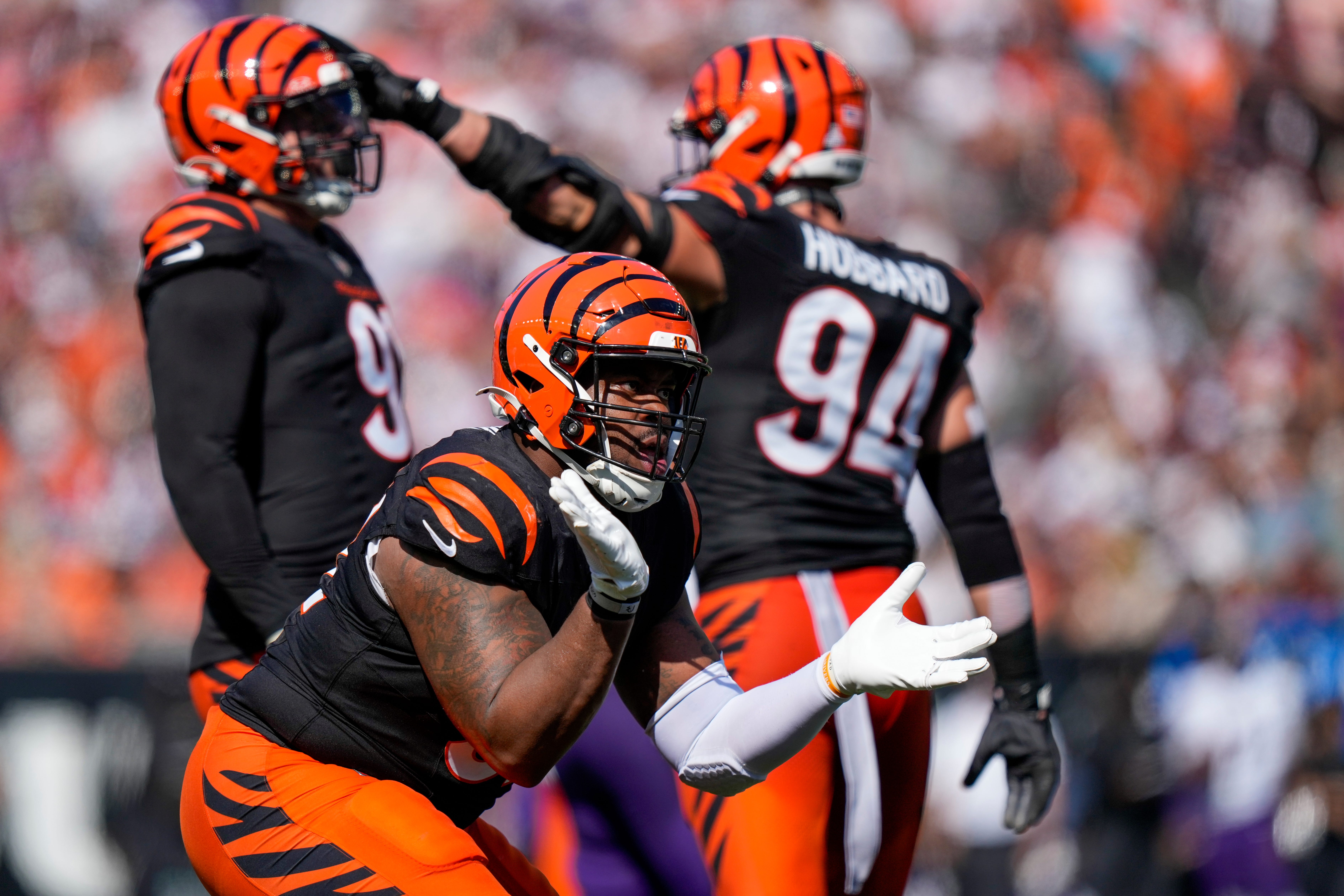 Cincinnati Bengals defensive tackle B.J. Hill (92) hypes up the crowd after a defensive stop in the second quarter of the NFL Week 5 game between the Cincinnati Bengals and Baltimore Ravens at Paycor Stadium in downtown Cincinnati on Sunday, Oct. 6, 2024. The Bengals led 17-14 at halftime.