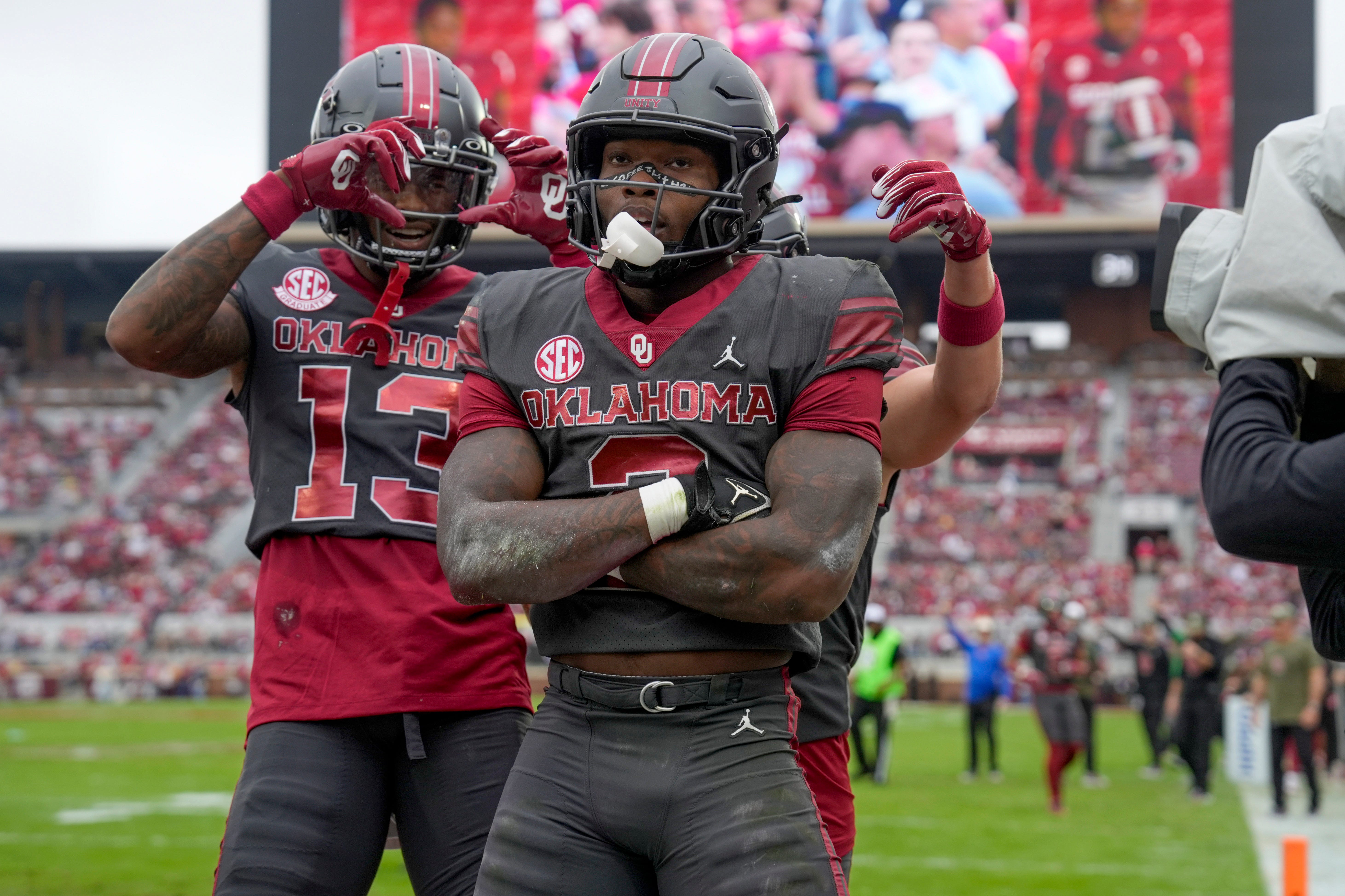 Oklahoma Sooners running back Jovantae Barnes (2) celebrates with Oklahoma Sooners wide receiver J.J. Hester (13) after a touchdown during a college football game between the University of Oklahoma Sooners (OU) and the Maine Black Bears at Gaylord Family - Oklahoma Memorial Stadium in Norman, Okla., Saturday, Nov. 2, 2024.