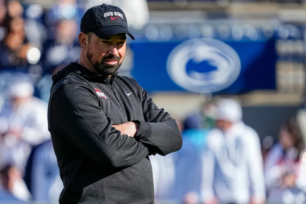 Ohio State Buckeyes head coach Ryan Day watches warm ups prior to the NCAA football game against the Penn State Nittany Lions at Beaver Stadium in University Park, Pa. on Saturday, Nov. 2, 2024