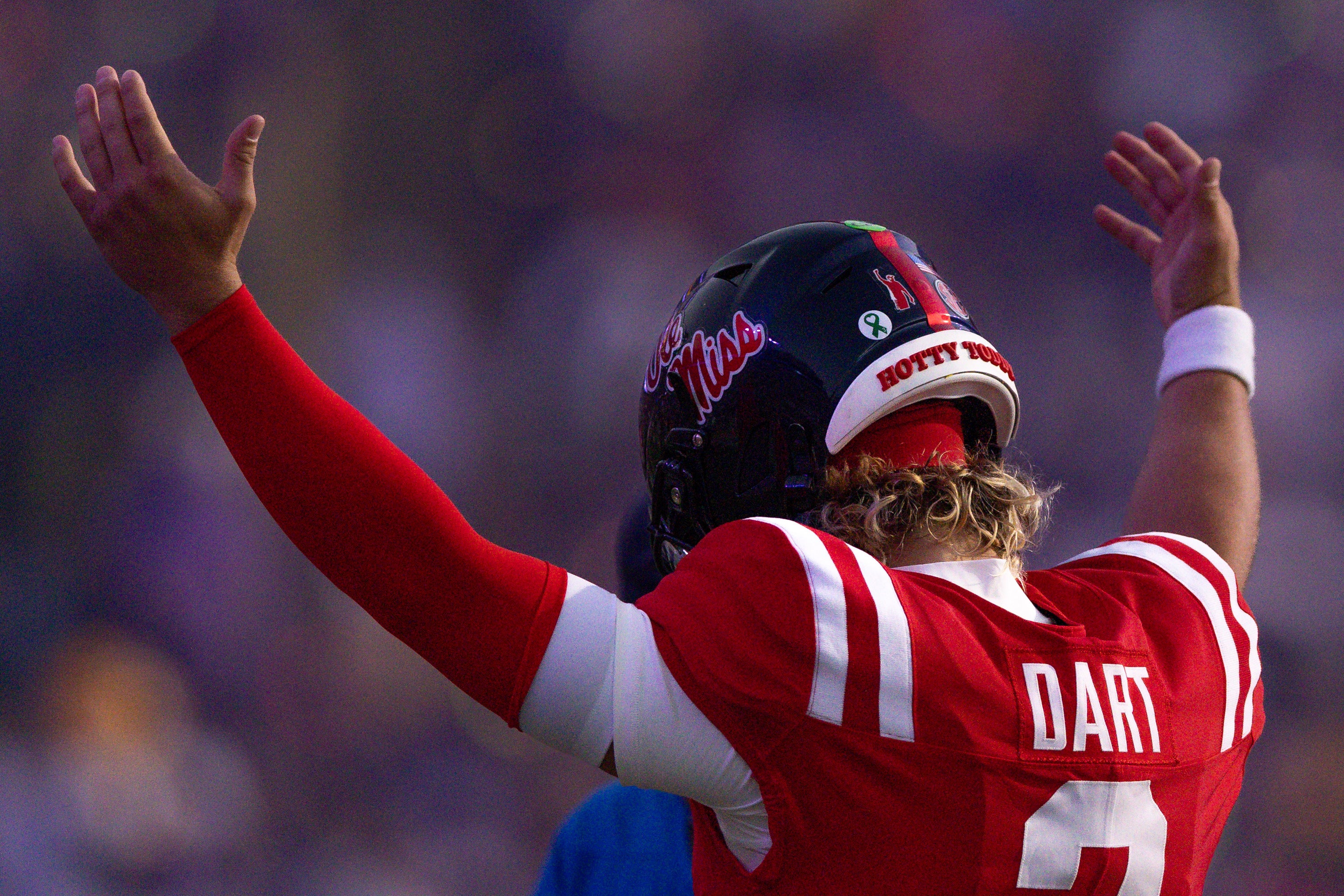 Oct 12, 2024; Baton Rouge, Louisiana, USA; Mississippi Rebels quarterback Jaxson Dart (2) walks on the field against the LSU Tigers during the first half at Tiger Stadium.